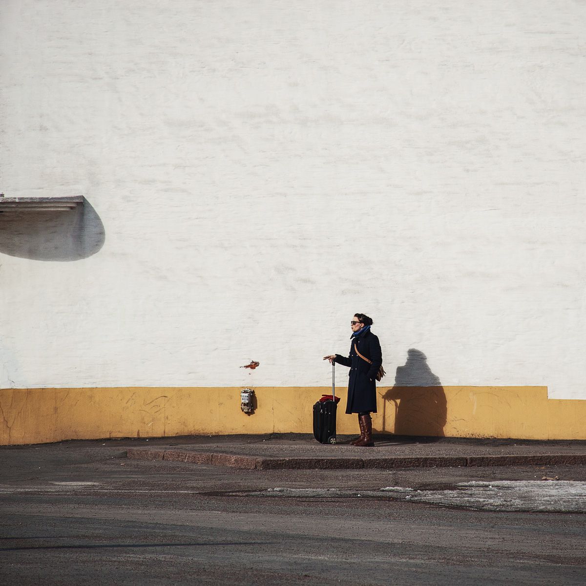 Woman with Suitcase in Helsinki