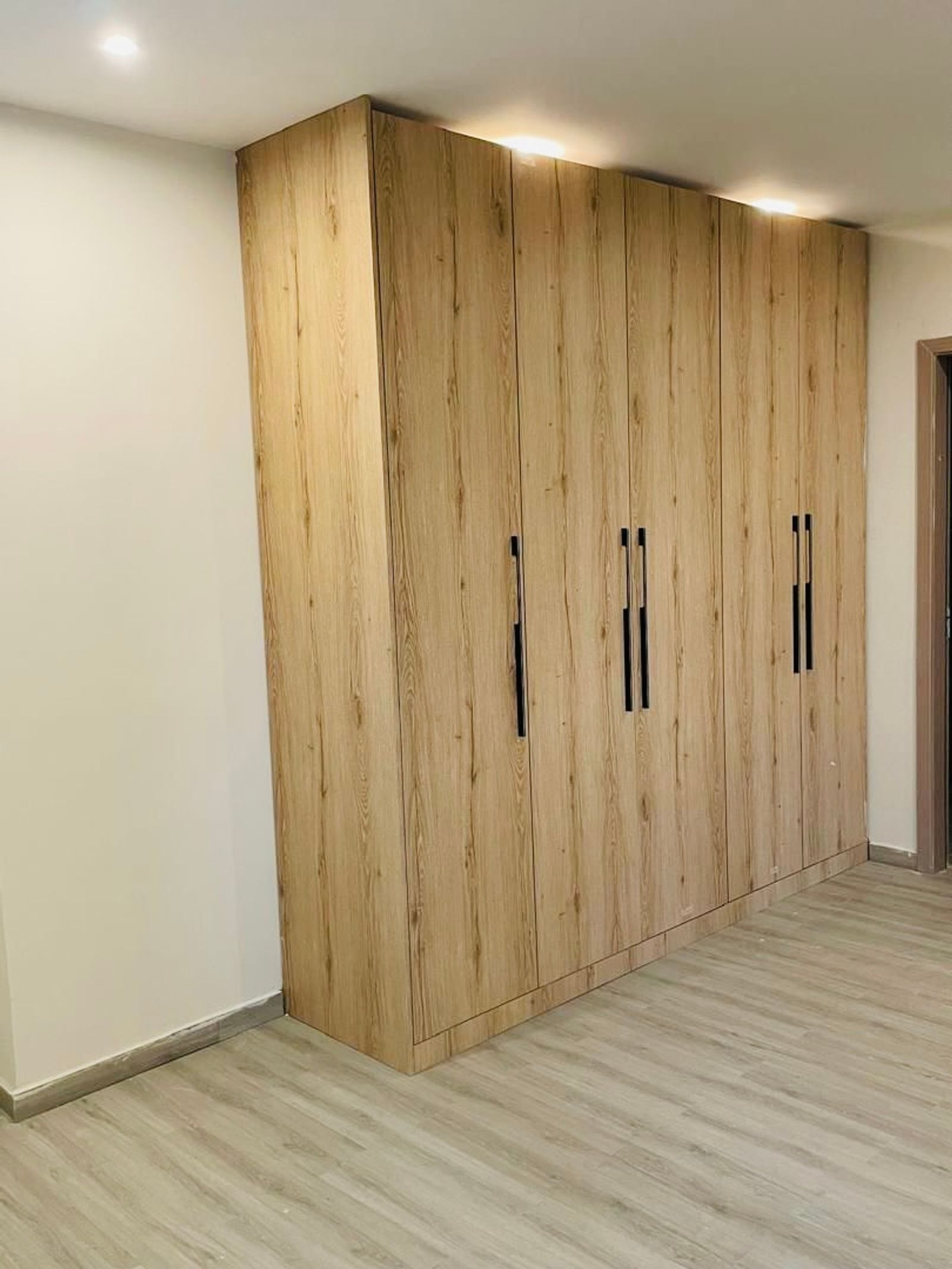 The Light Oak Wardrobe in a styled interior