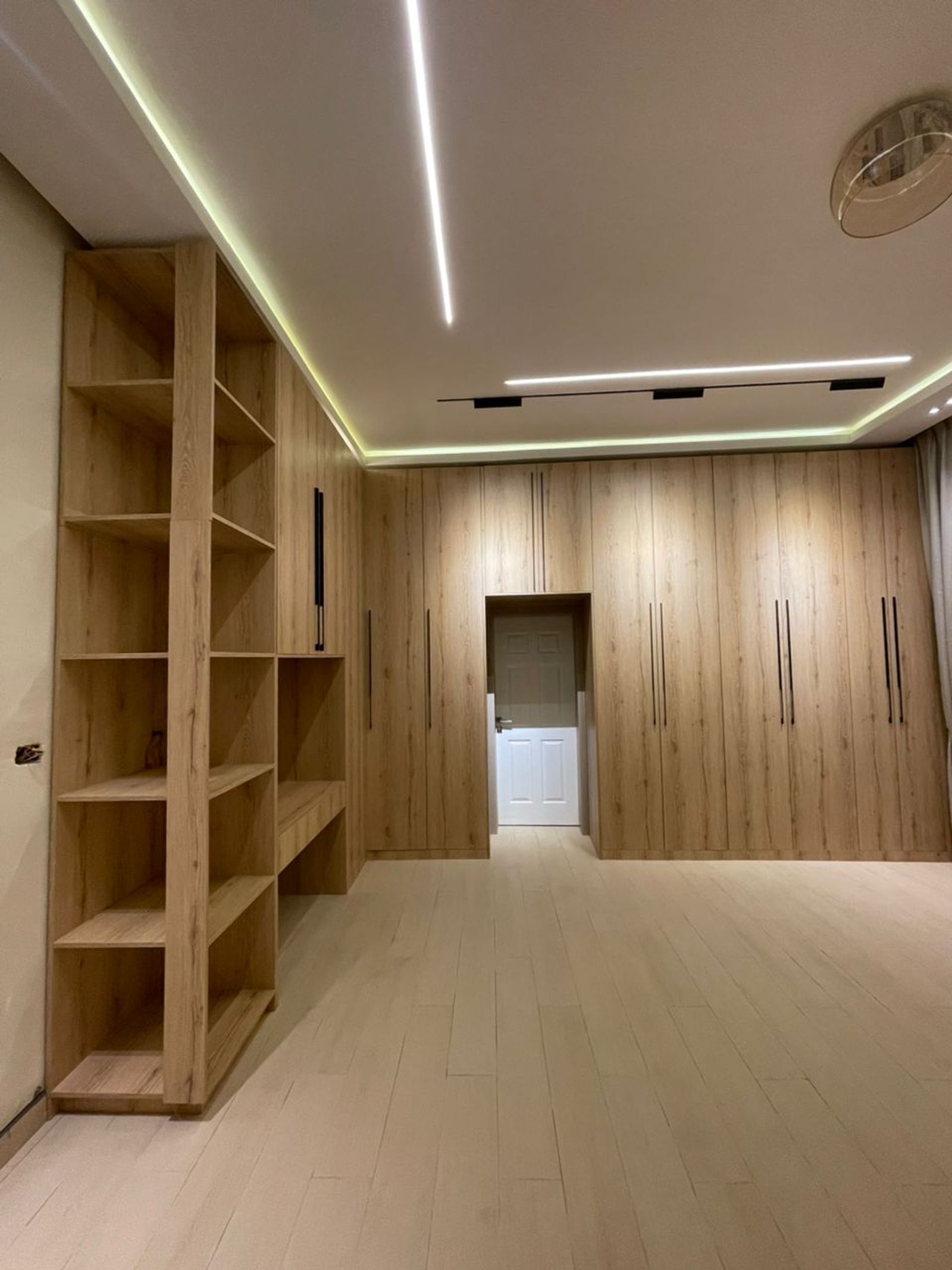 The Full-Wall Closet Suite in a styled interior