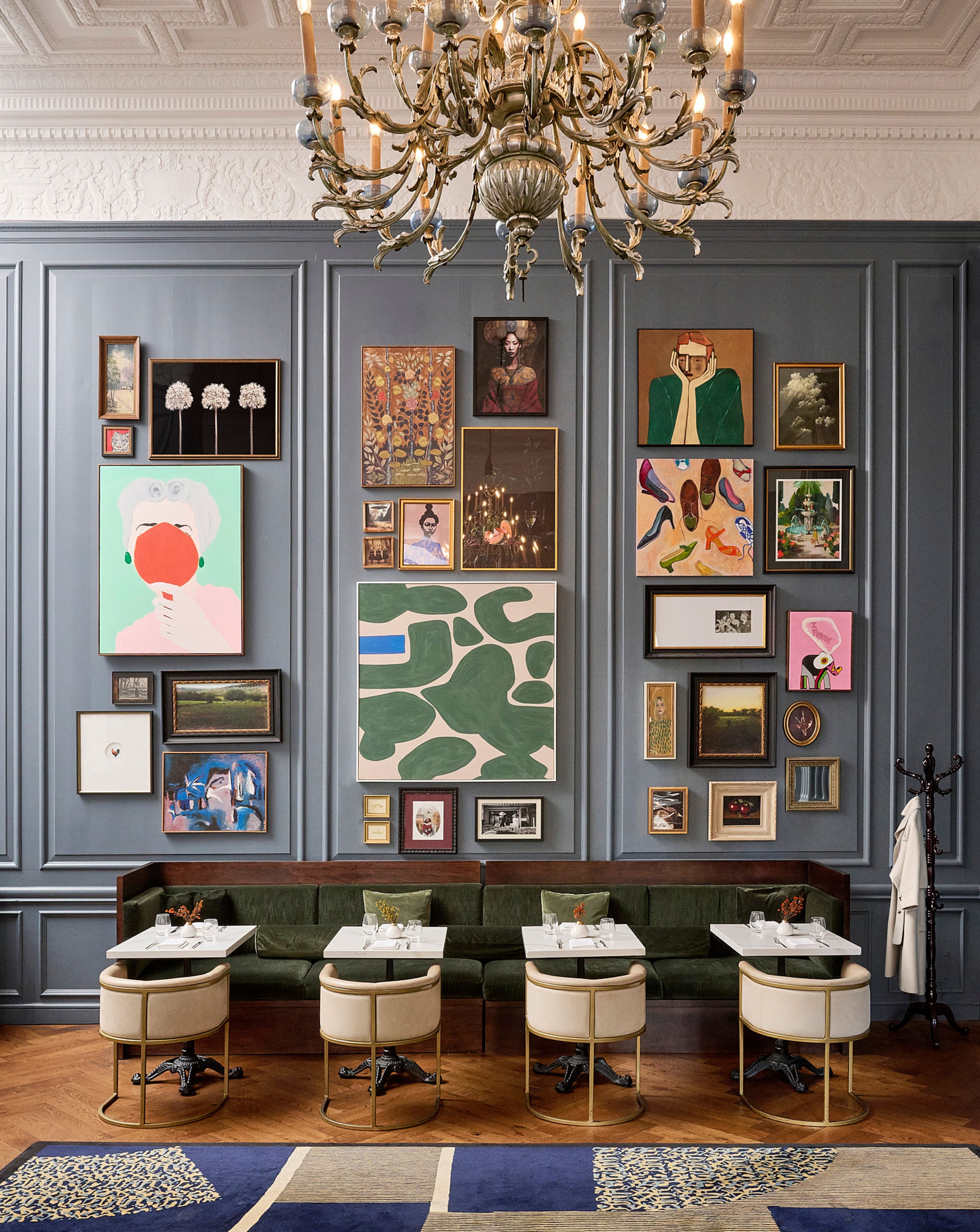 the lobby of a hotel with ornate ceilings and chandeliers.