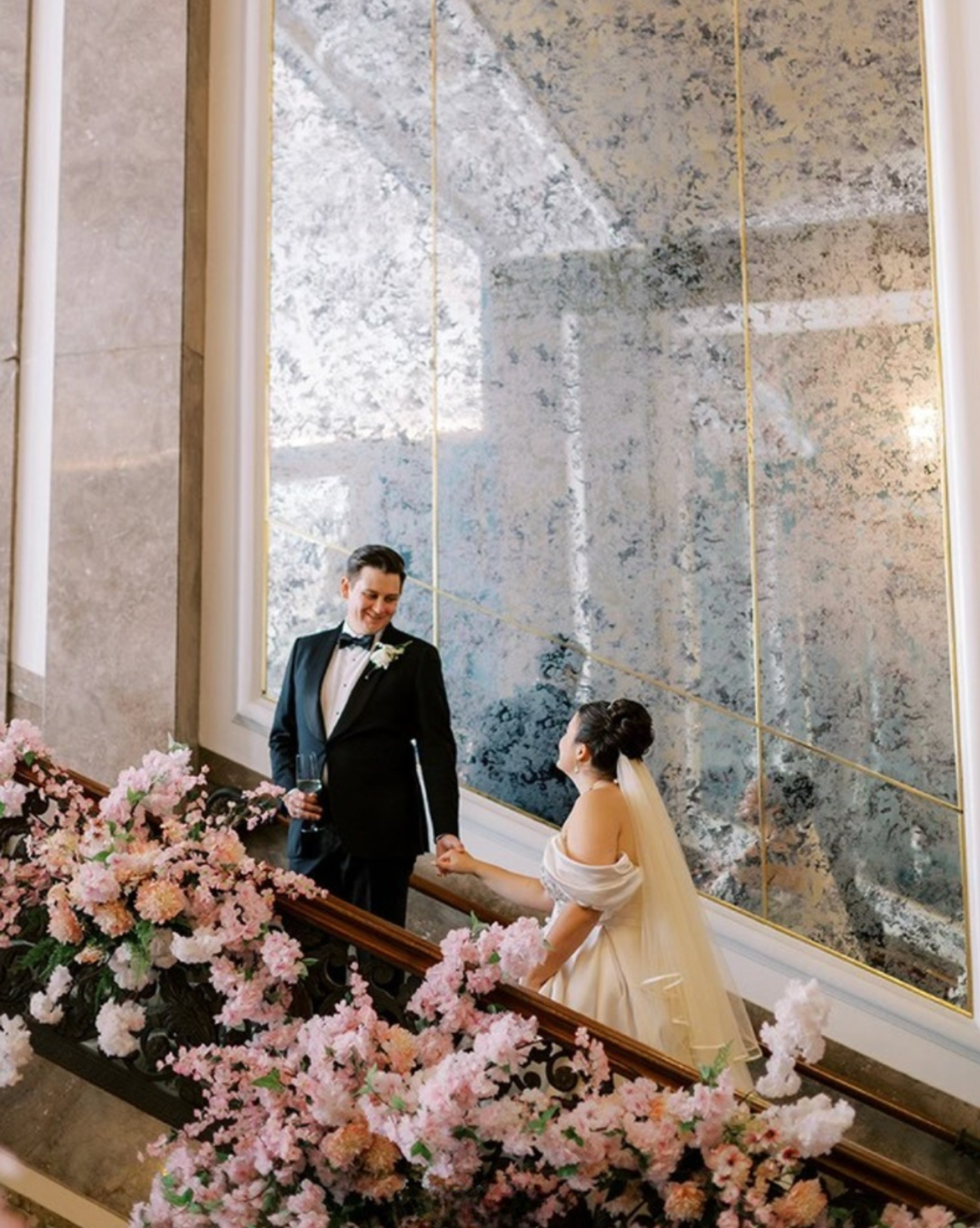 bride and groom on staircase