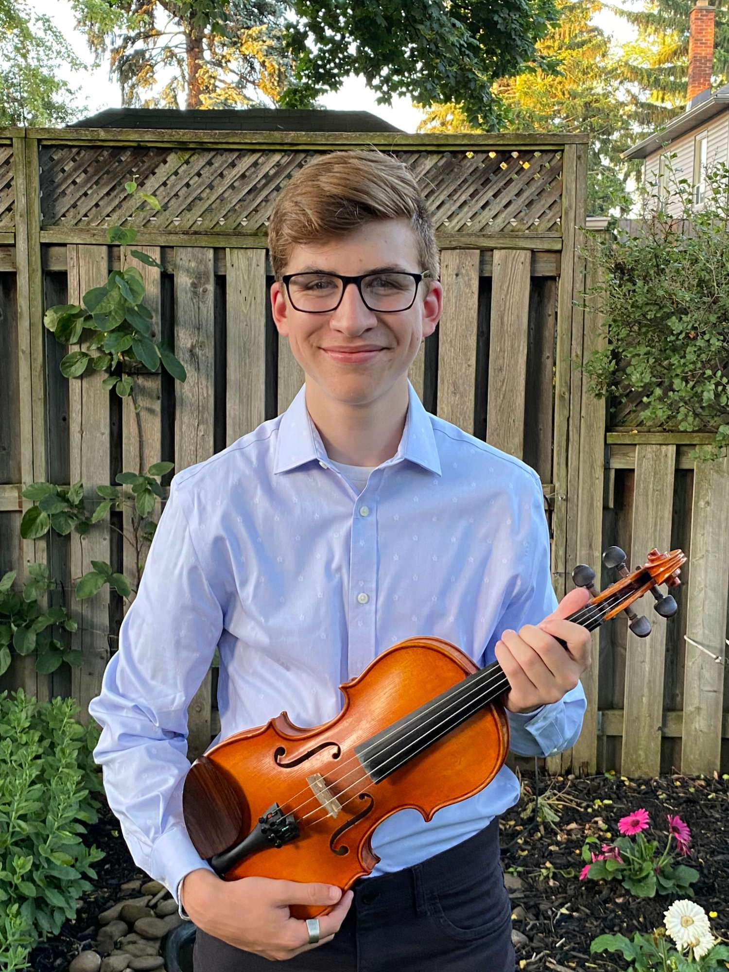 Photo de Malcolm Hauber avec son violon