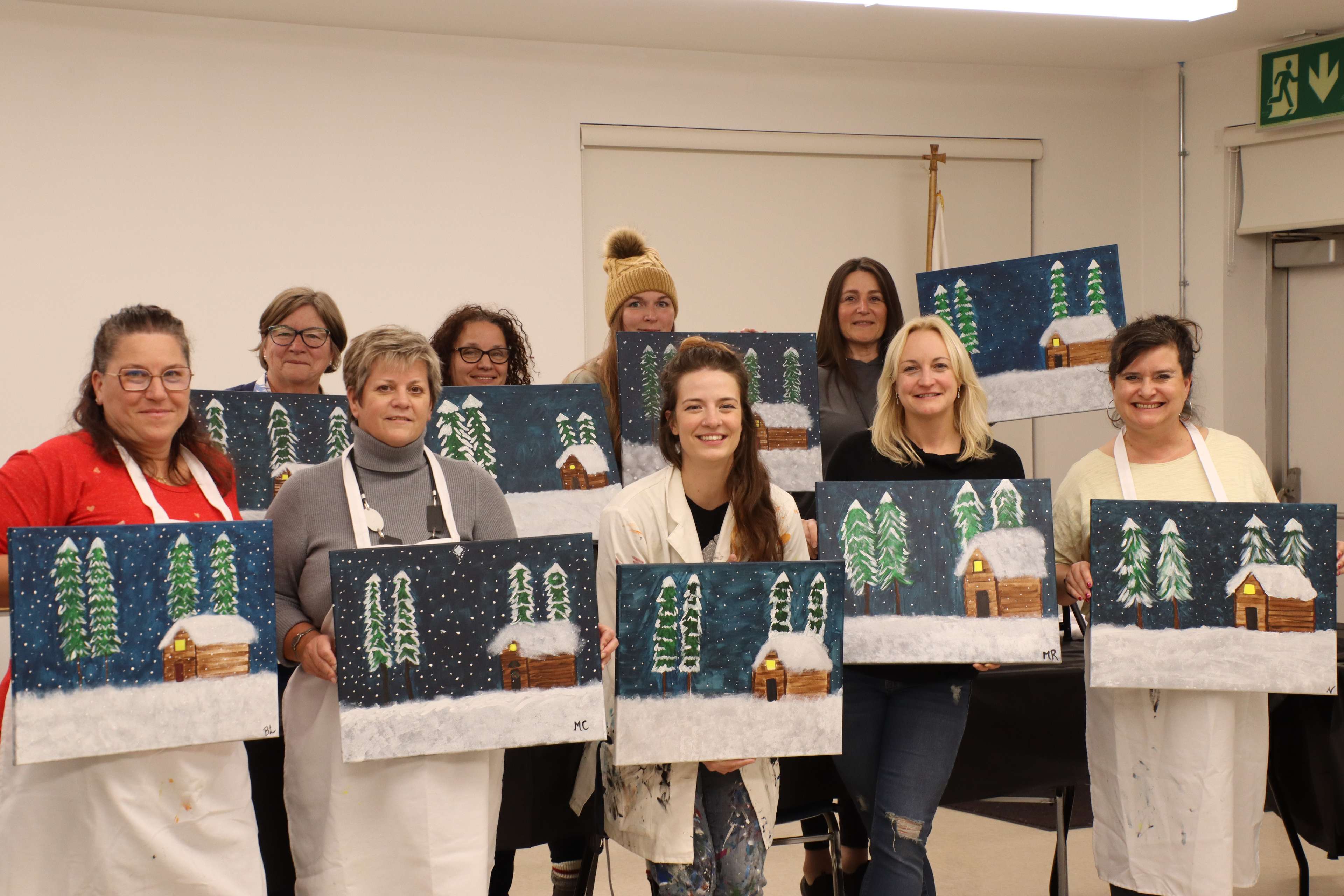 Une photo de groupe avec leurs toiles