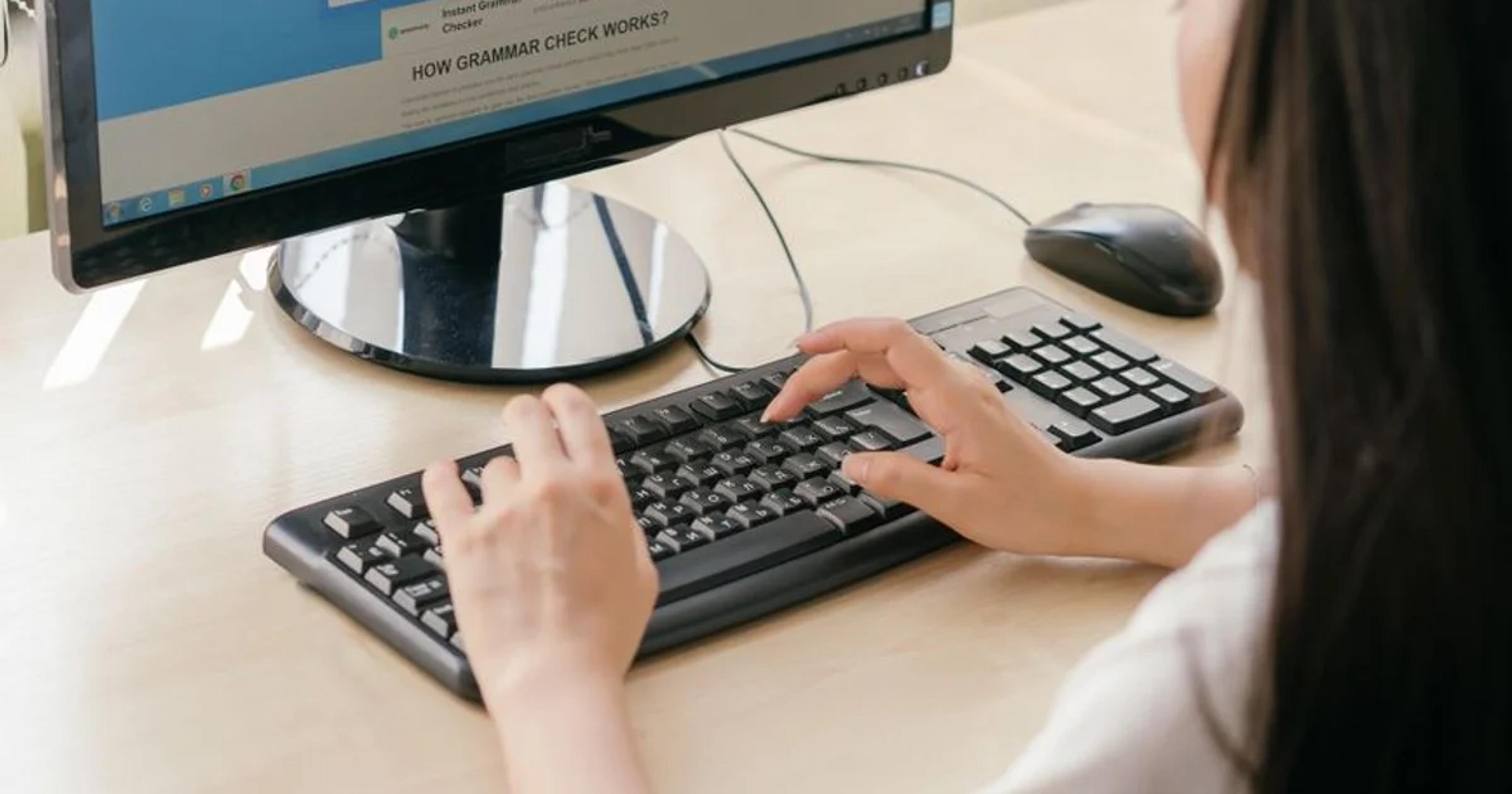 Professional reviewing digital content for ADA Title II academic procurement compliance