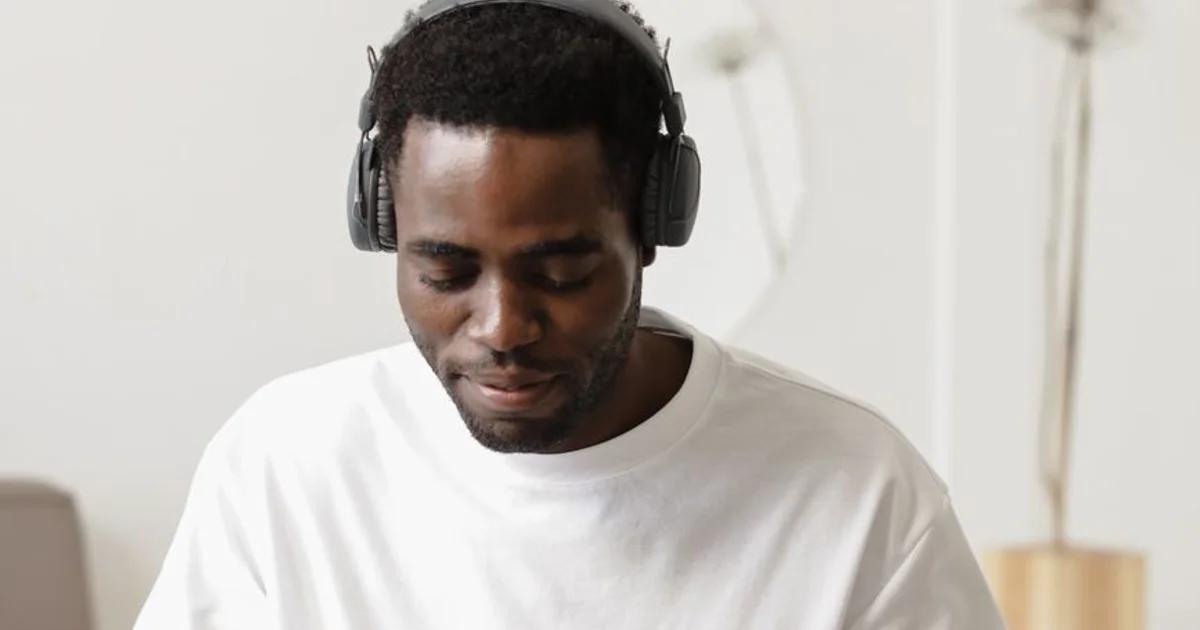 A person using assistive technology to listen to an ADA compliant civic podcast