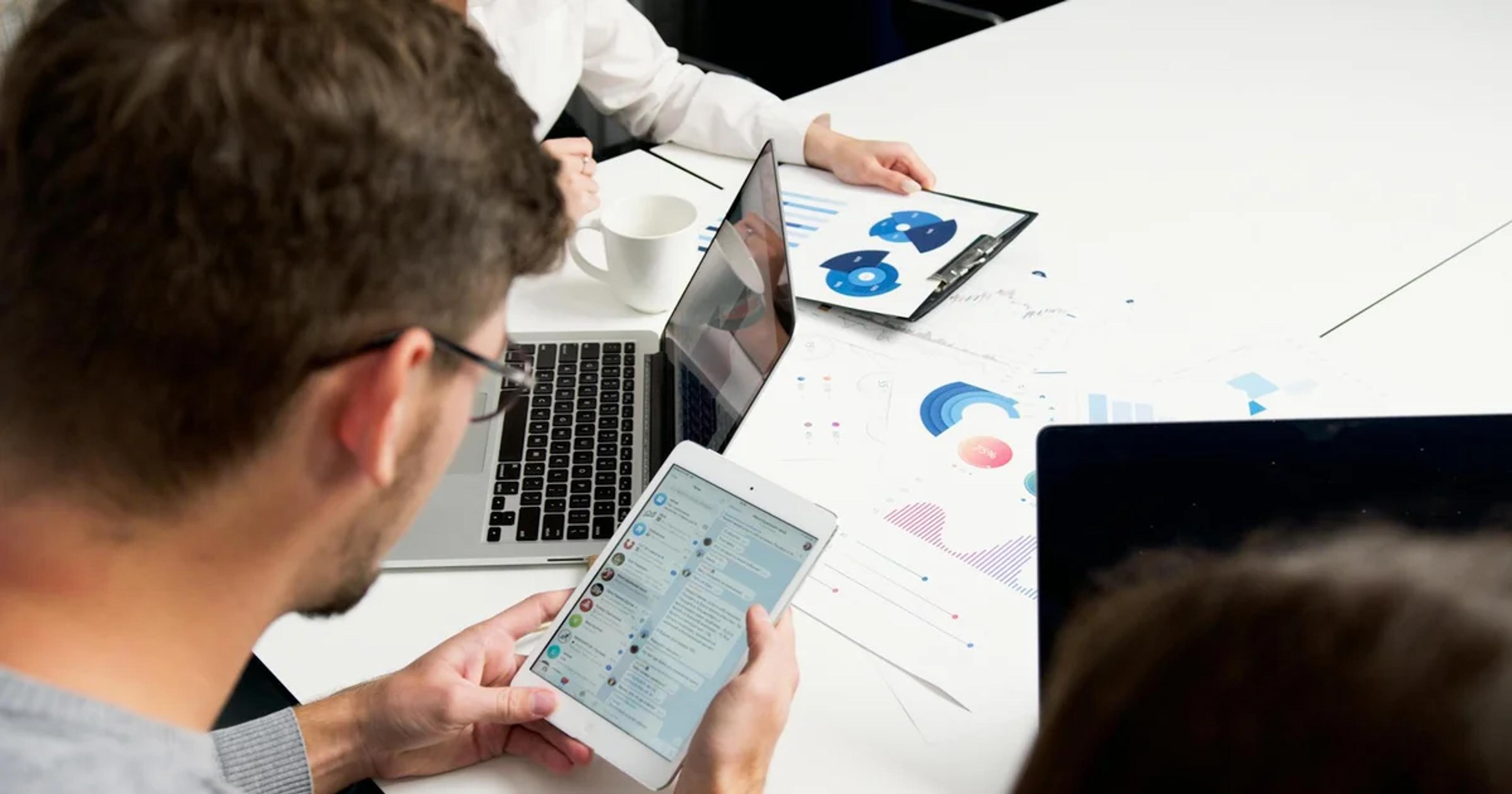 Diverse team collaborating on secure GovTech platforms to enhance digital government services and accessibility.