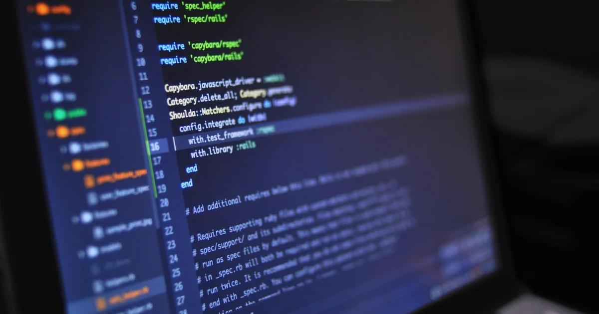 Developer reviewing ADA-compliant legacy APIs on a screen for digital accessibility