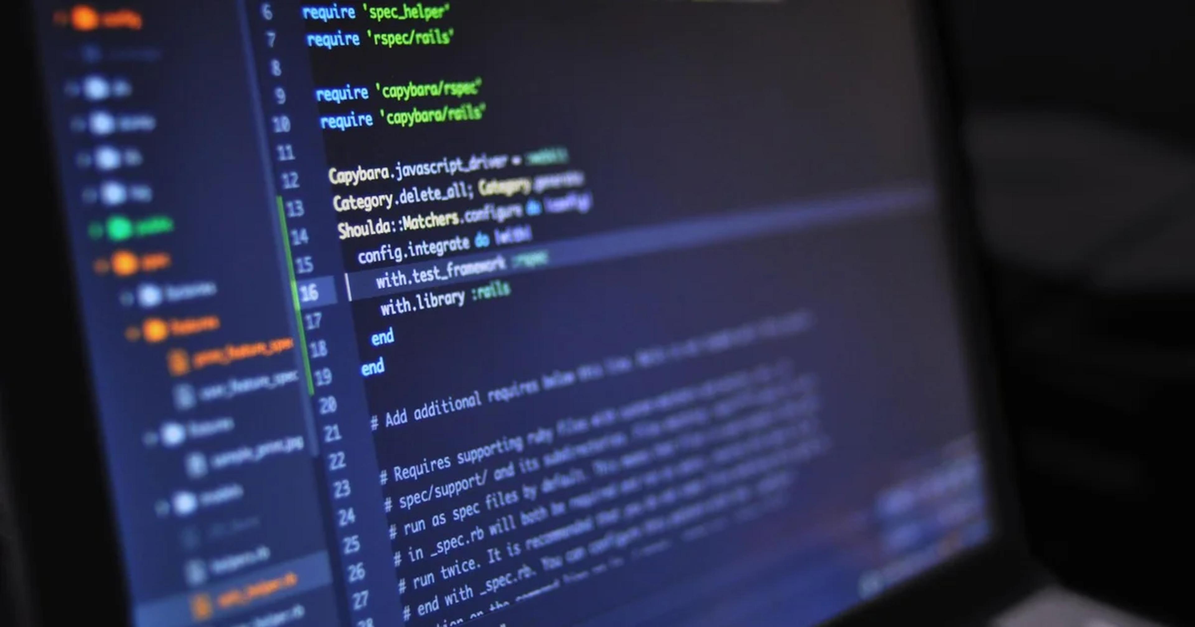 Developer reviewing ADA-compliant legacy APIs on a screen for digital accessibility
