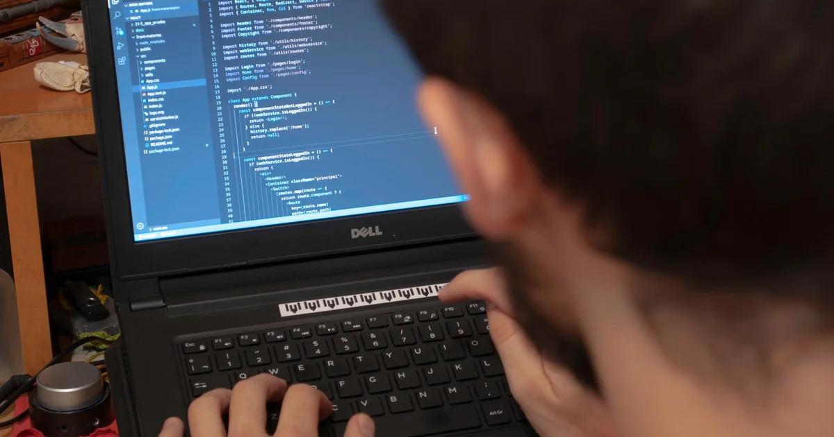 Professional analyzing ADA-compliant content migration dashboards on a computer screen
