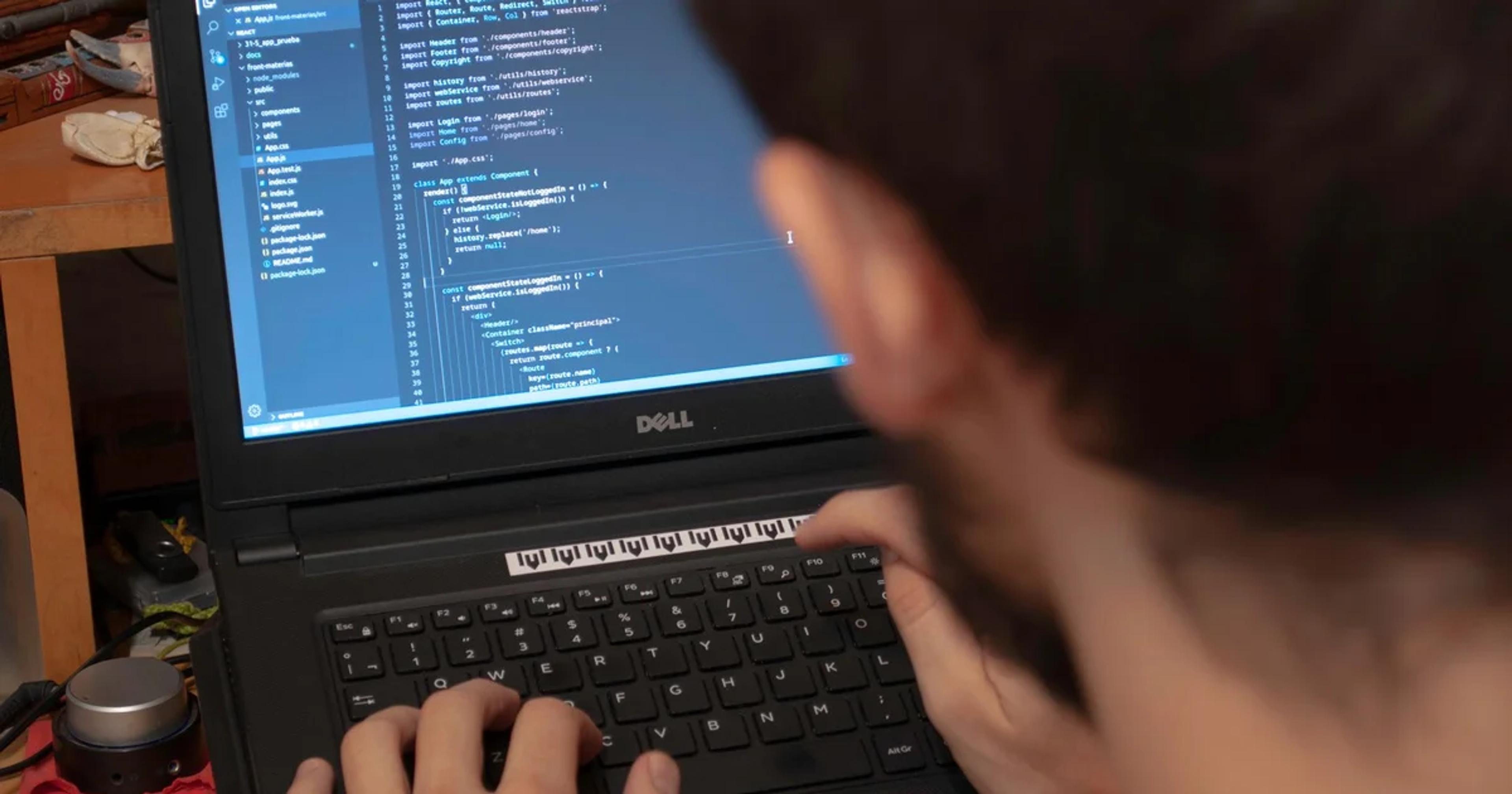 Professional analyzing ADA-compliant content migration dashboards on a computer screen