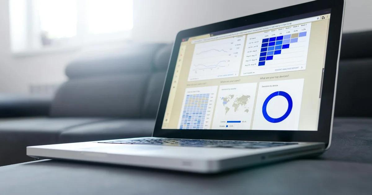 A professional analyzing a digital dashboard to recover legacy data accessibility debt