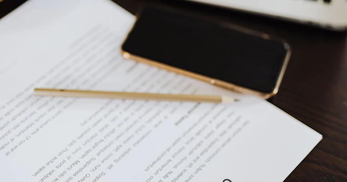 Professional reviewing an ADA extension contract on a digital tablet for web accessibility
