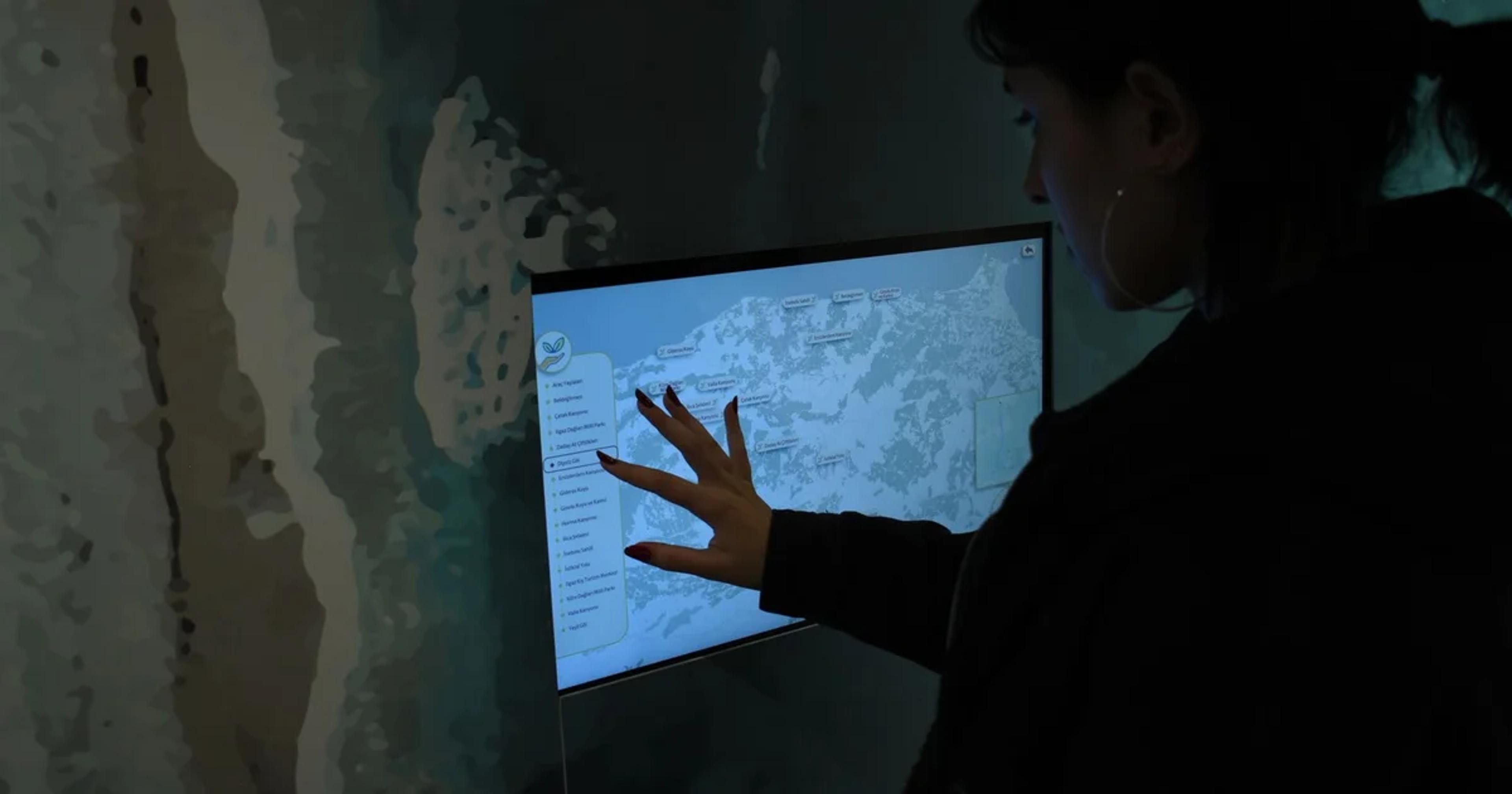 A person navigating an accessible interactive map as part of ADA compliance for civic geospatial.