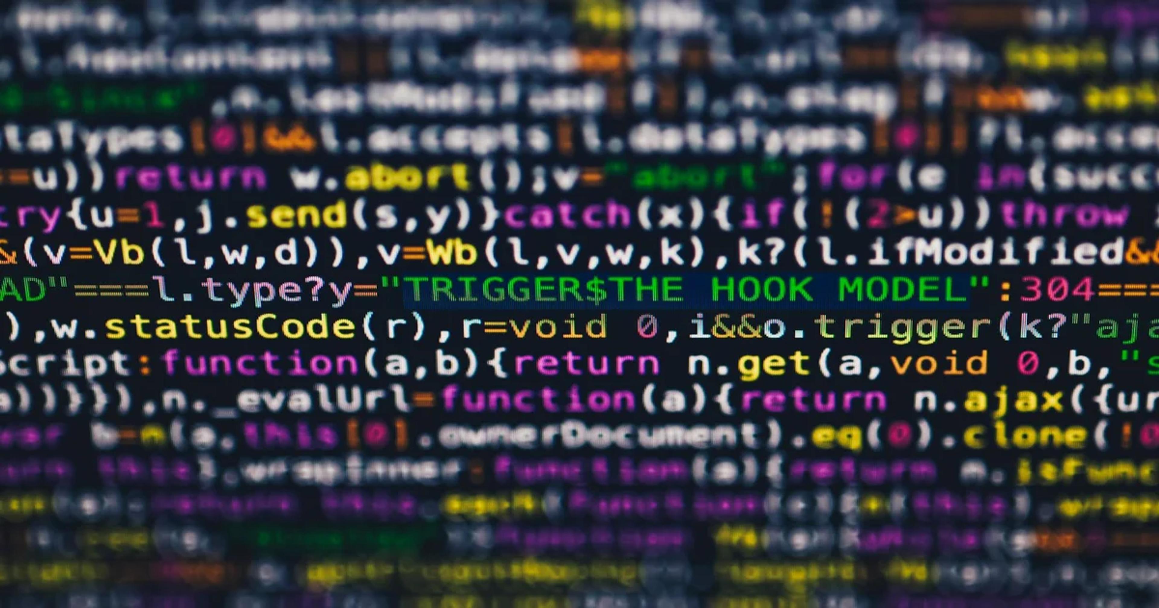 Developer reviewing code for web accessibility debt remediation