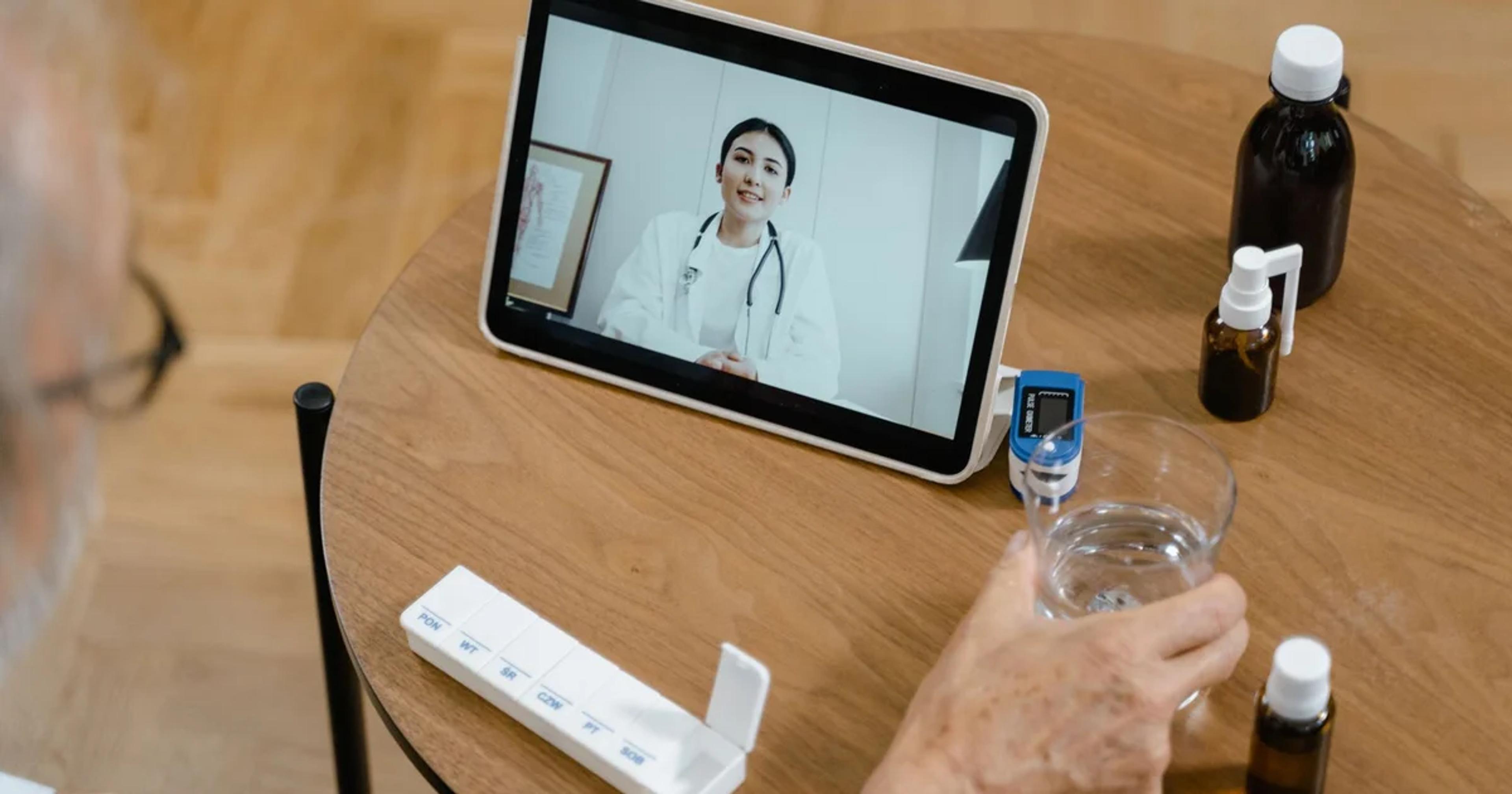 A professional using a screen reader on a device for ADA compliant telehealth services