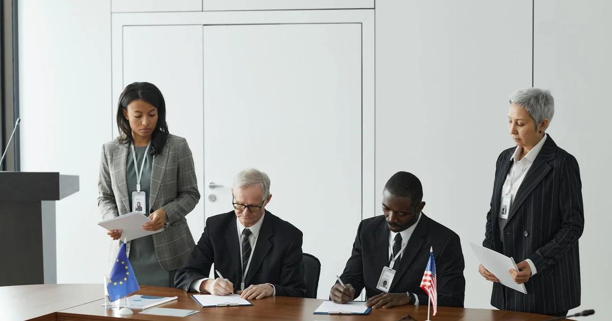 Government officials and tech professionals collaborating on accessible digital service interfaces, showcasing inclusive design principles and technology integration.