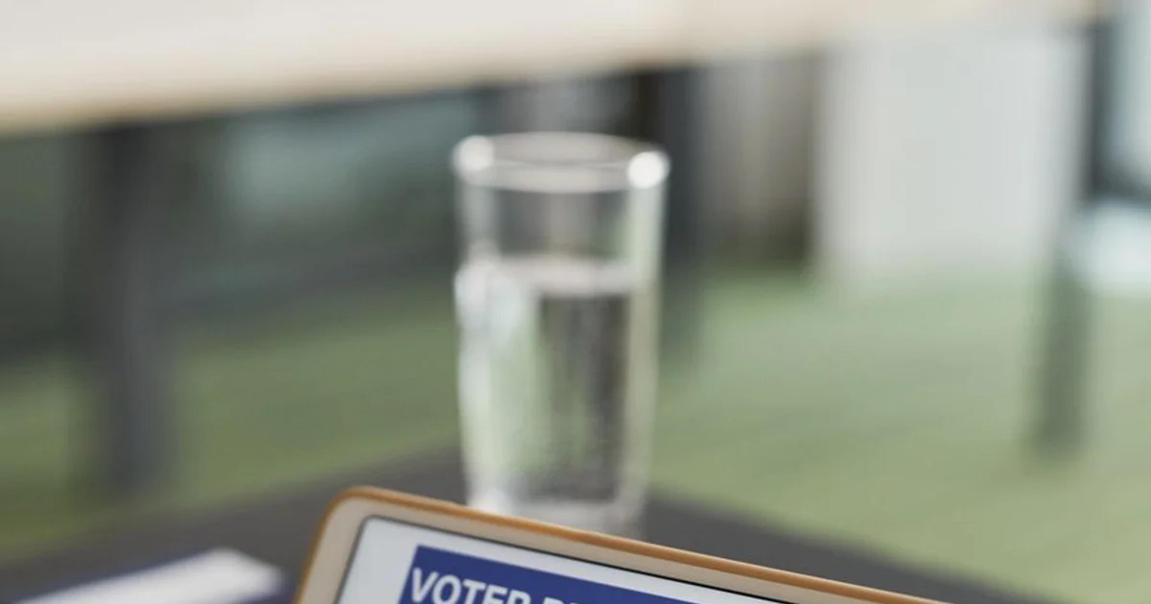 A voter interacting with an accessible civic digital election ballot interface on a tablet