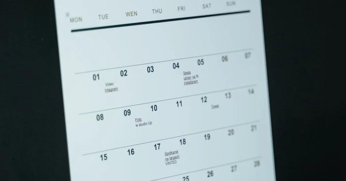 Team discussing staggered ADA deadline management strategy in a modern office, focusing on digital accessibility.