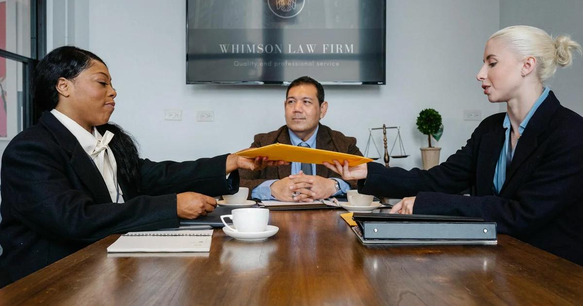 Professionals discussing cost-sensitive accessibility standards and DOJ compliance strategies.