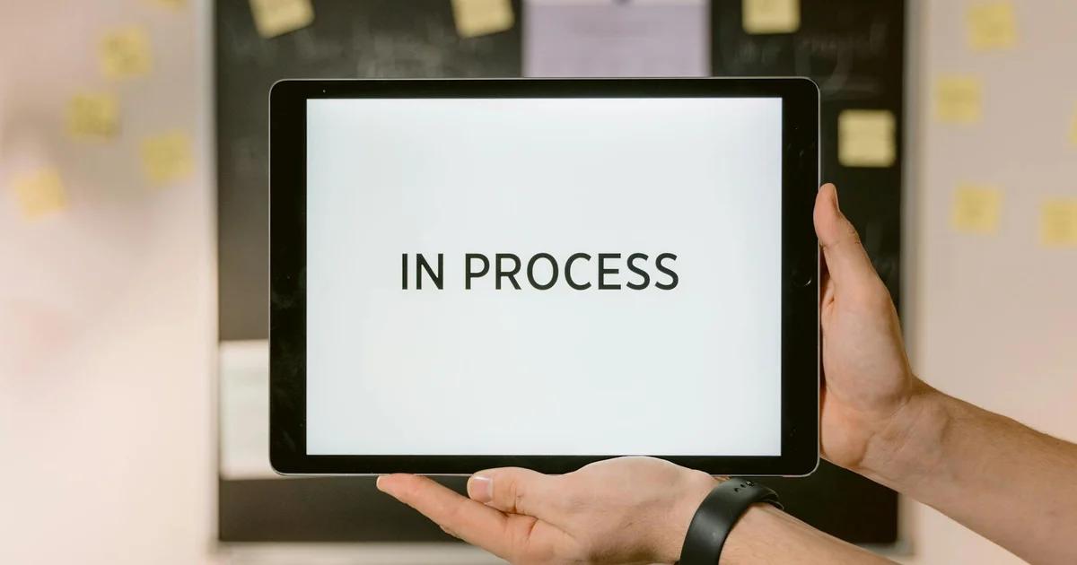 Professionals collaborating to avoid the digital accessibility extension complacency trap in government services.