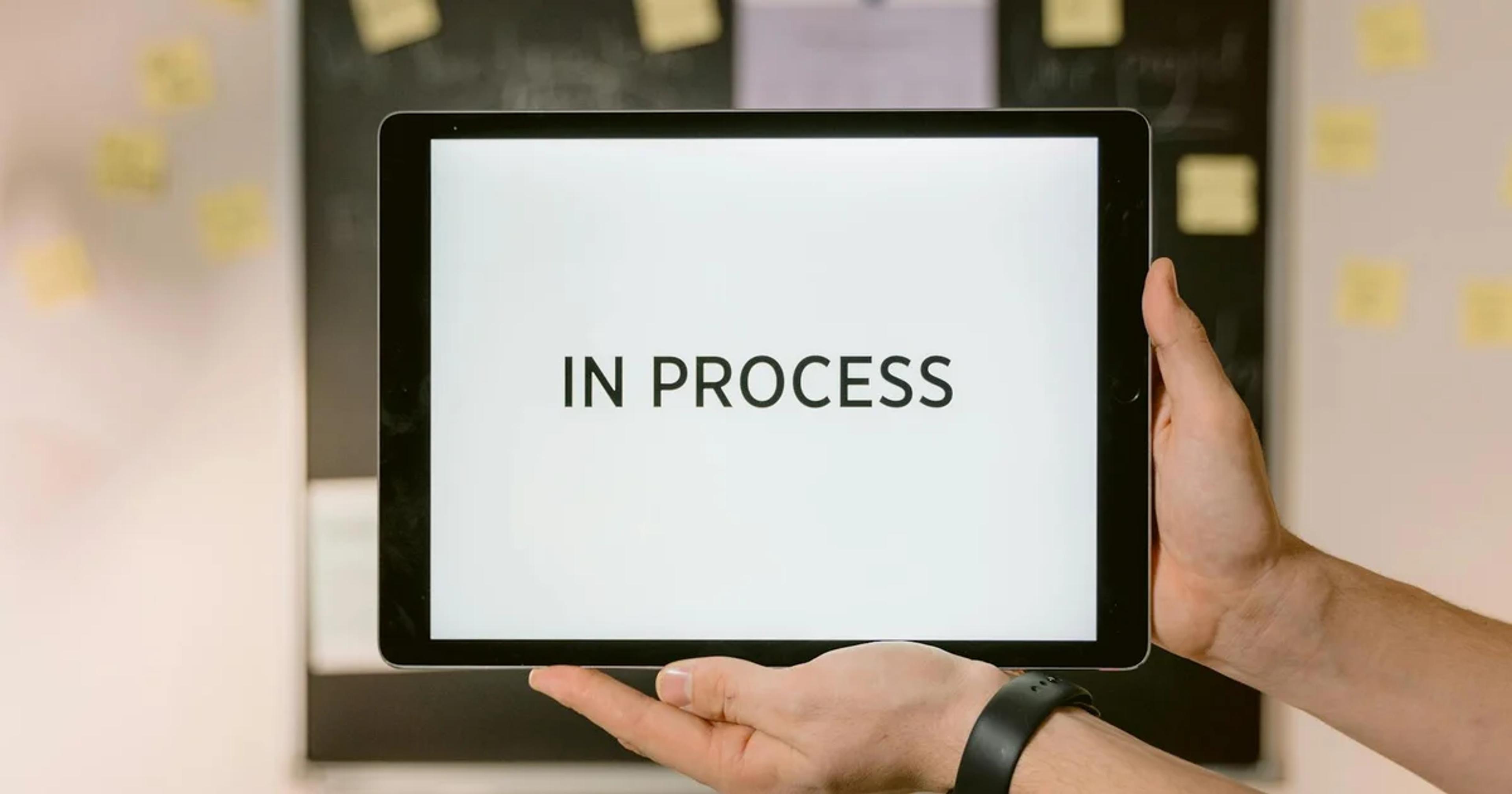 Professionals collaborating to avoid the digital accessibility extension complacency trap in government services.