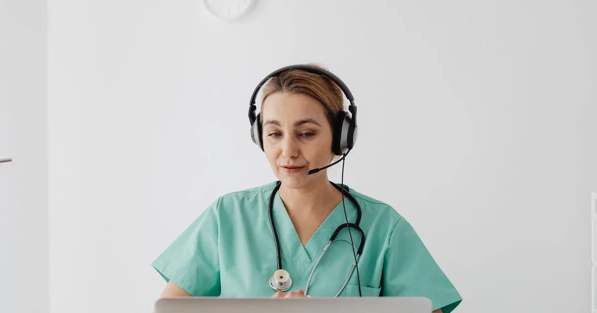 A patient using a mobile device for a remote ADA compliant telehealth medical consultation.