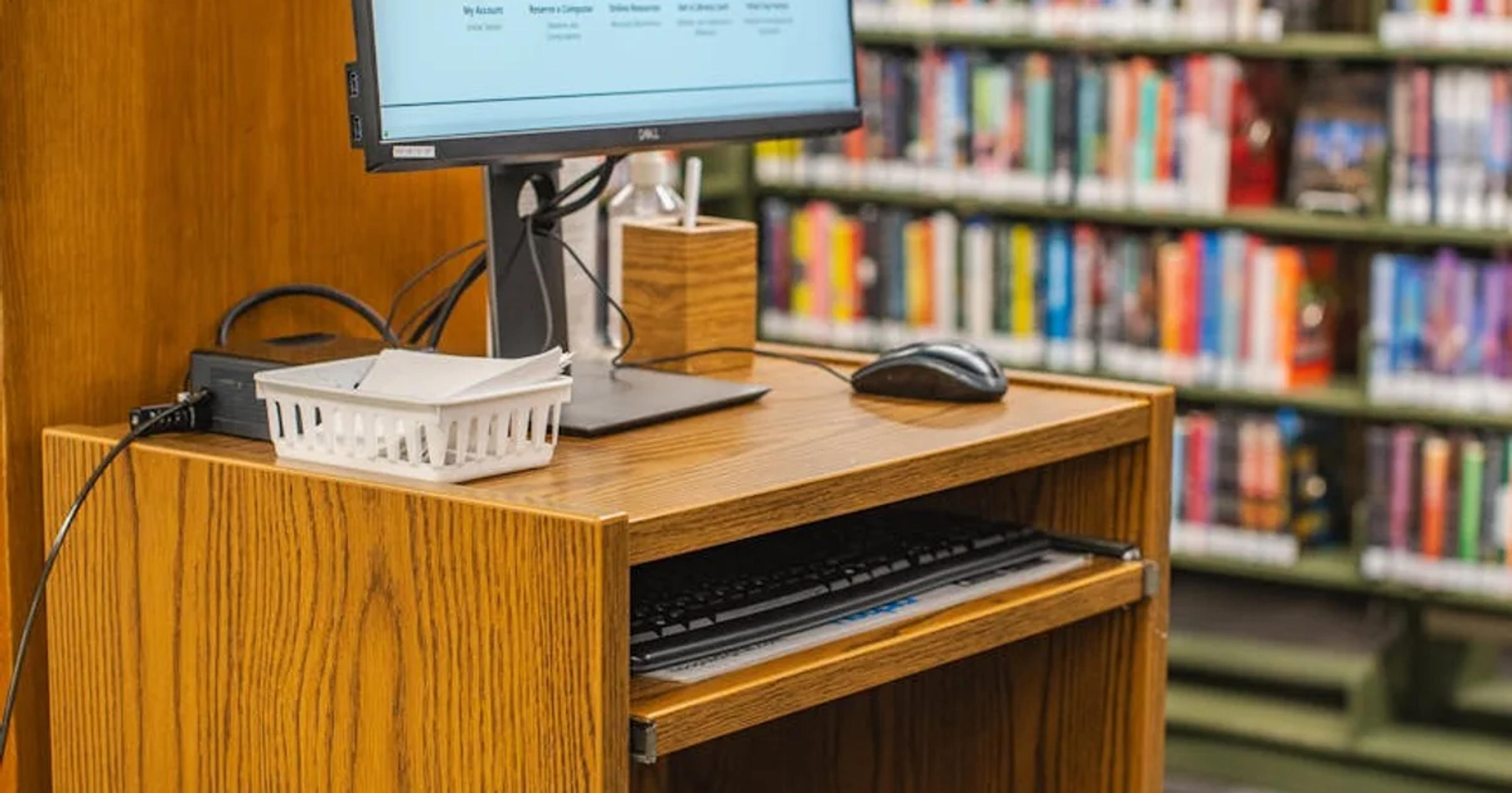 Diverse users engaging with a digital library, highlighting digital accessibility and ADA compliance.