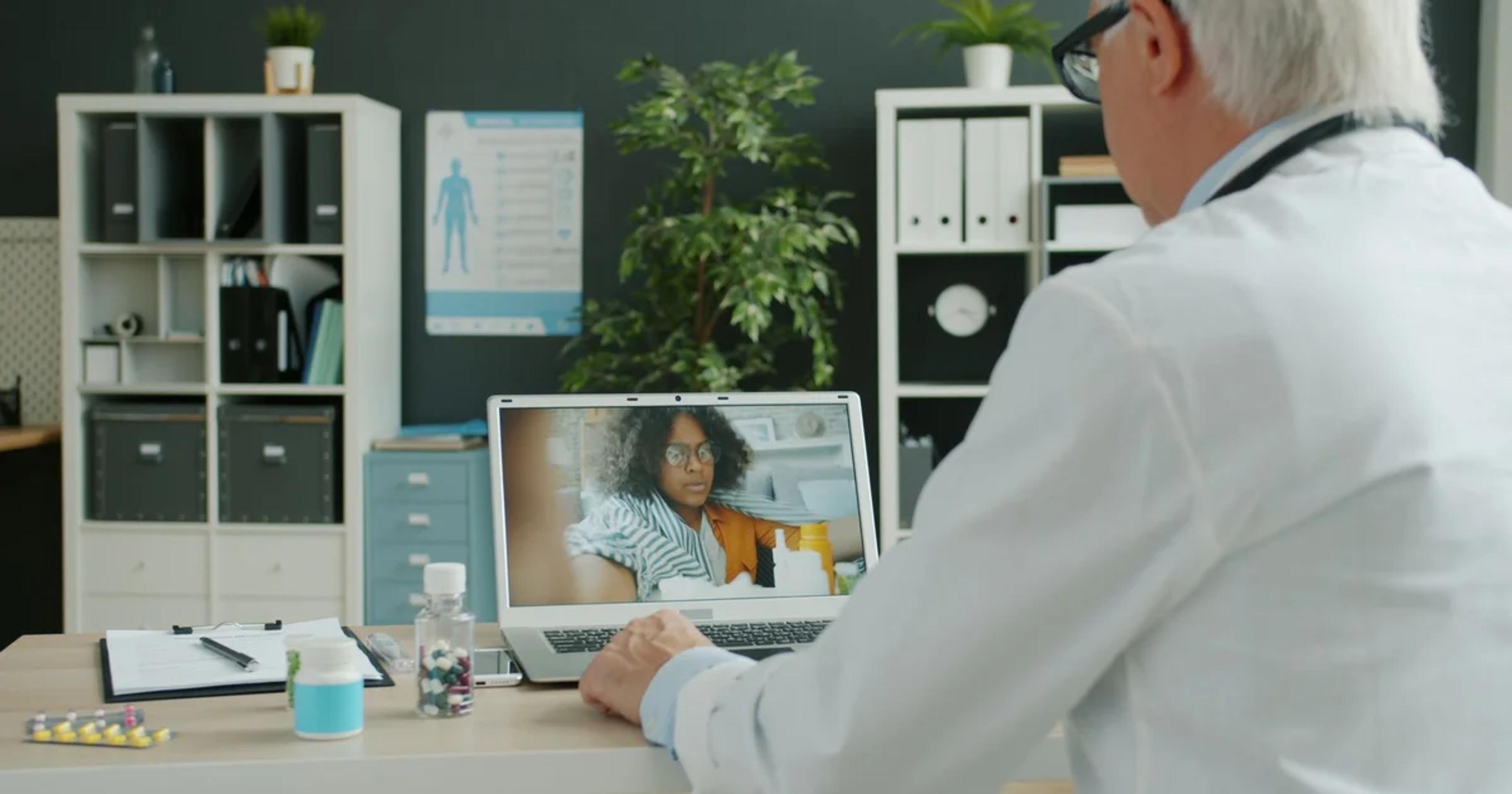A diverse group of public officials using ADA compliant civic videoconferencing software