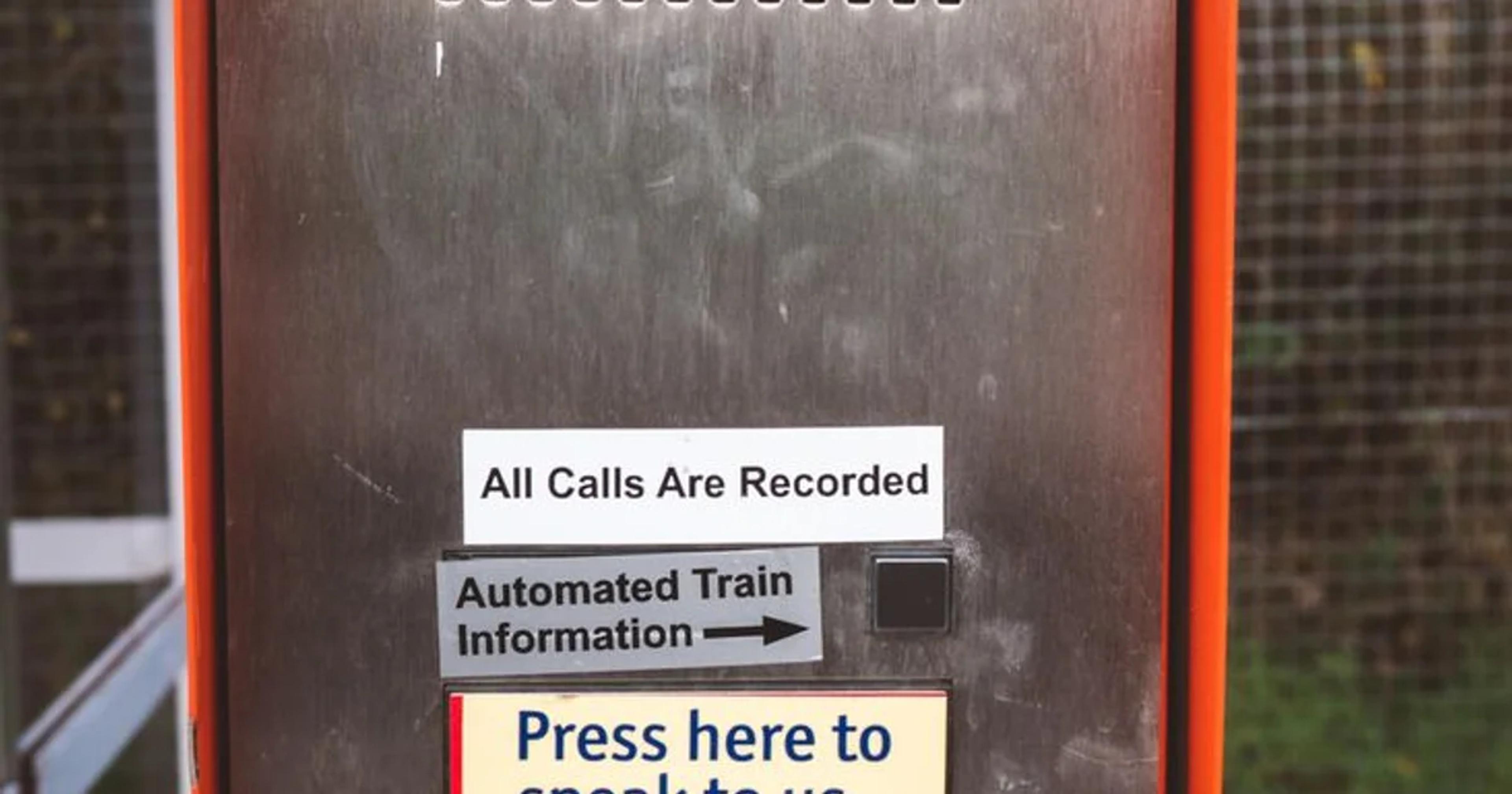 A person using a smartphone with an inclusive digital emergency alert notification displayed