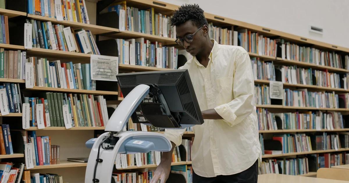 University student using a screen reader for accessible academic digital content compliance, emphasizing inclusivity.