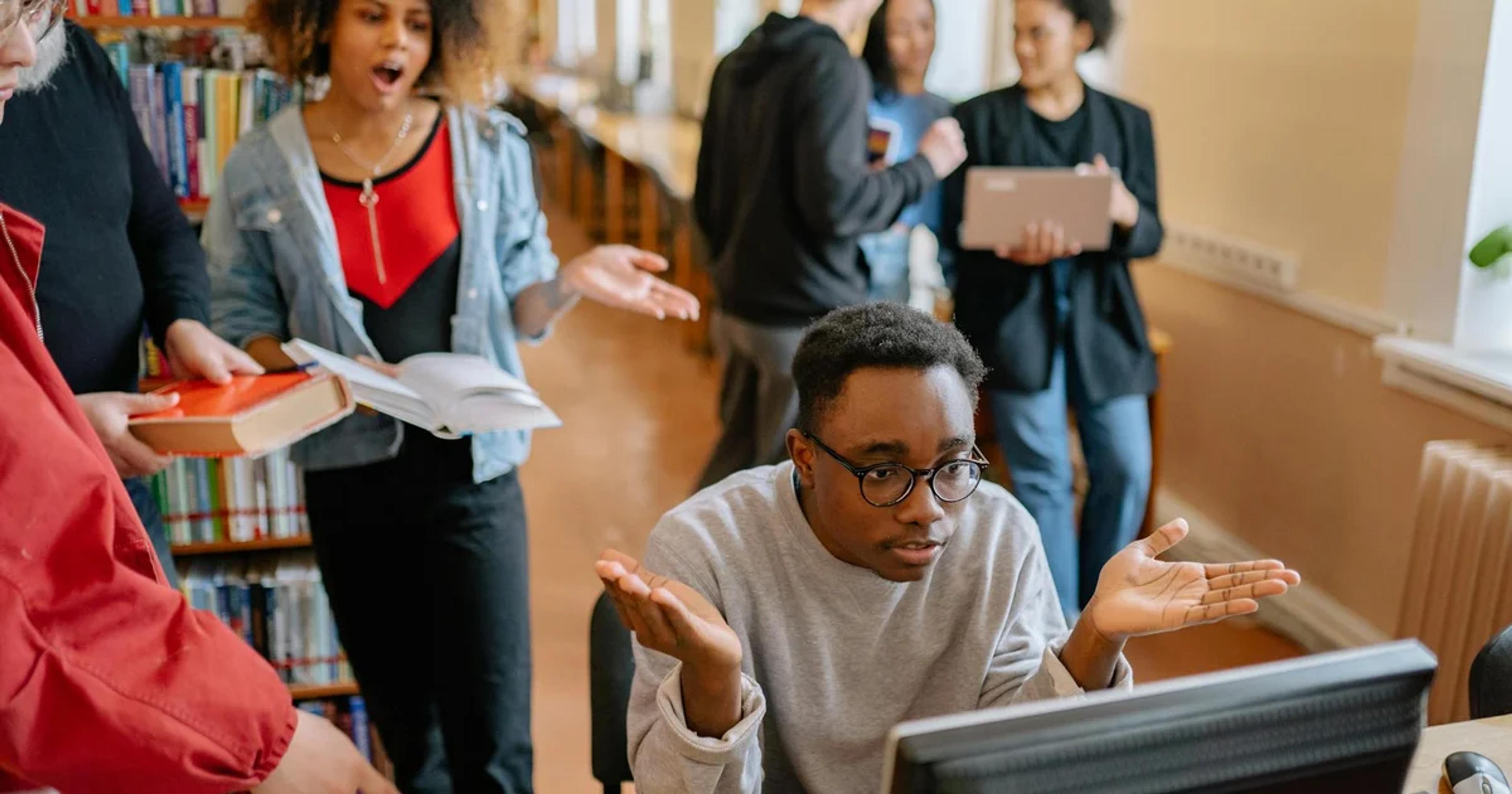 Diverse student journalists ensuring their digital publications meet Student Press ADA Compliance standards.