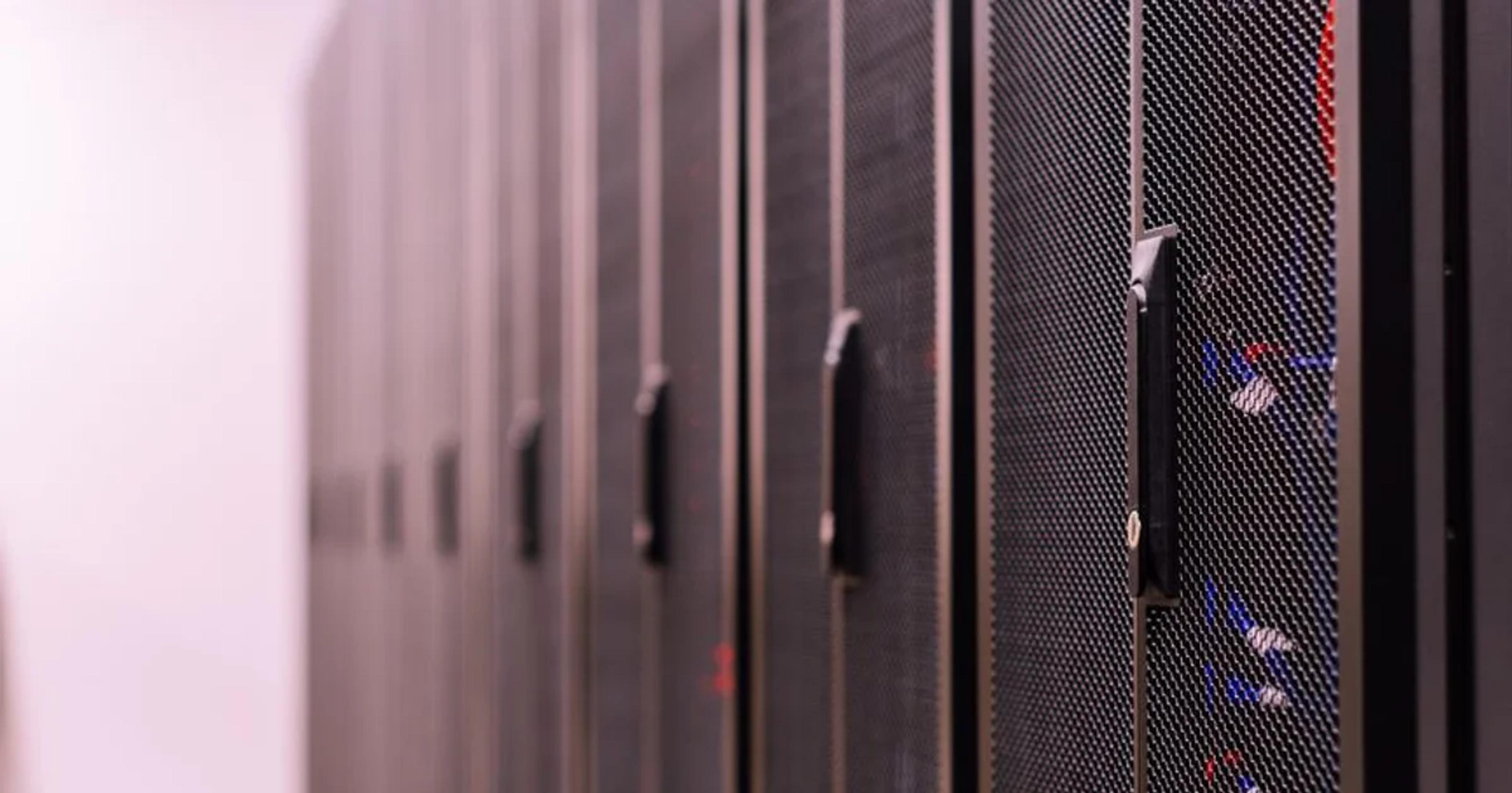 Professional team performing ADA compliance for civic load-testing on server monitors