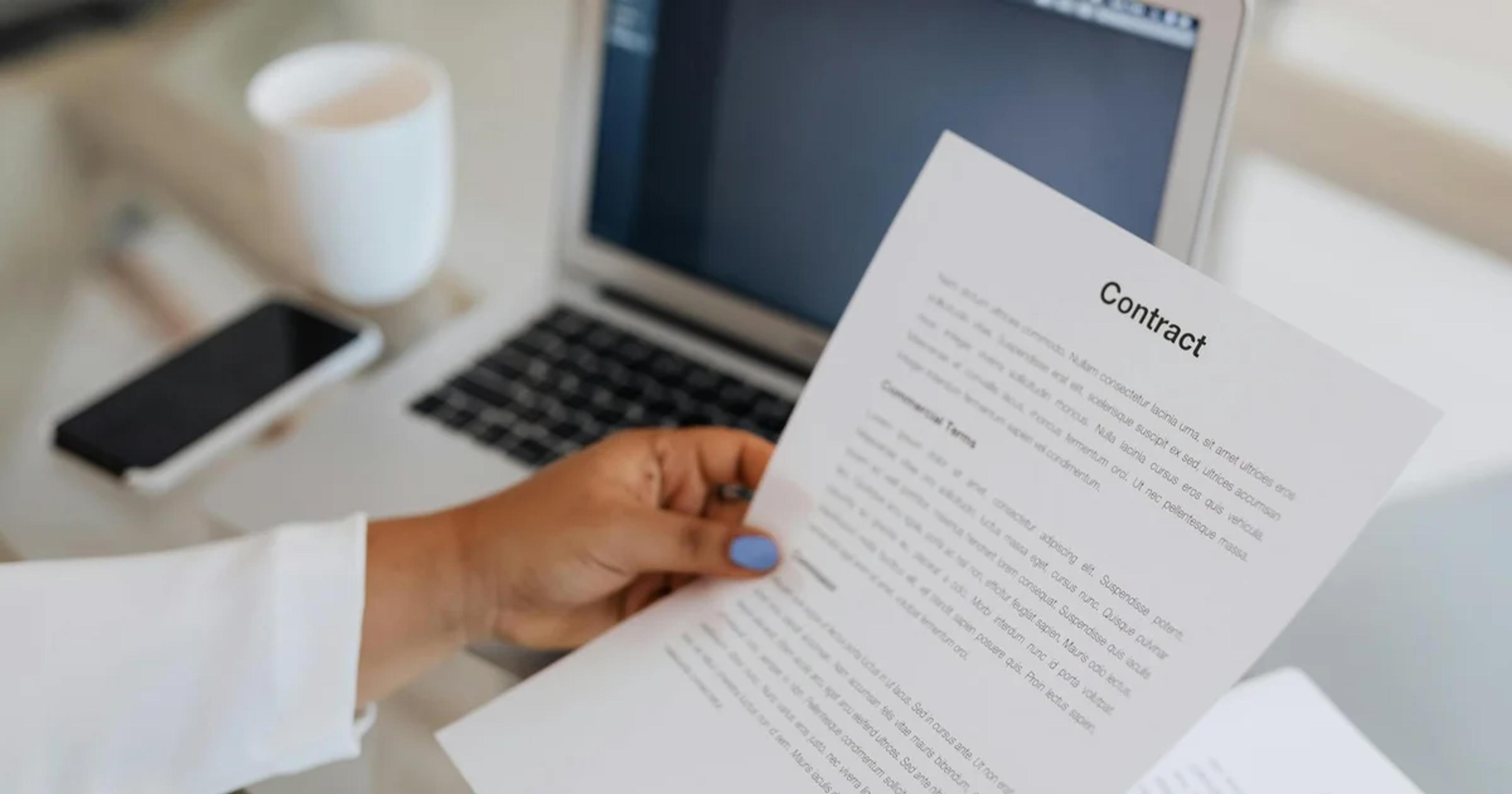 A professional reviewing a public sector procurement document for digital accessibility compliance