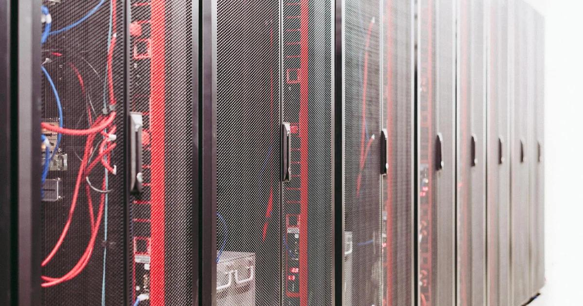 A professional team managing a complex legacy system sunset migration in a server room