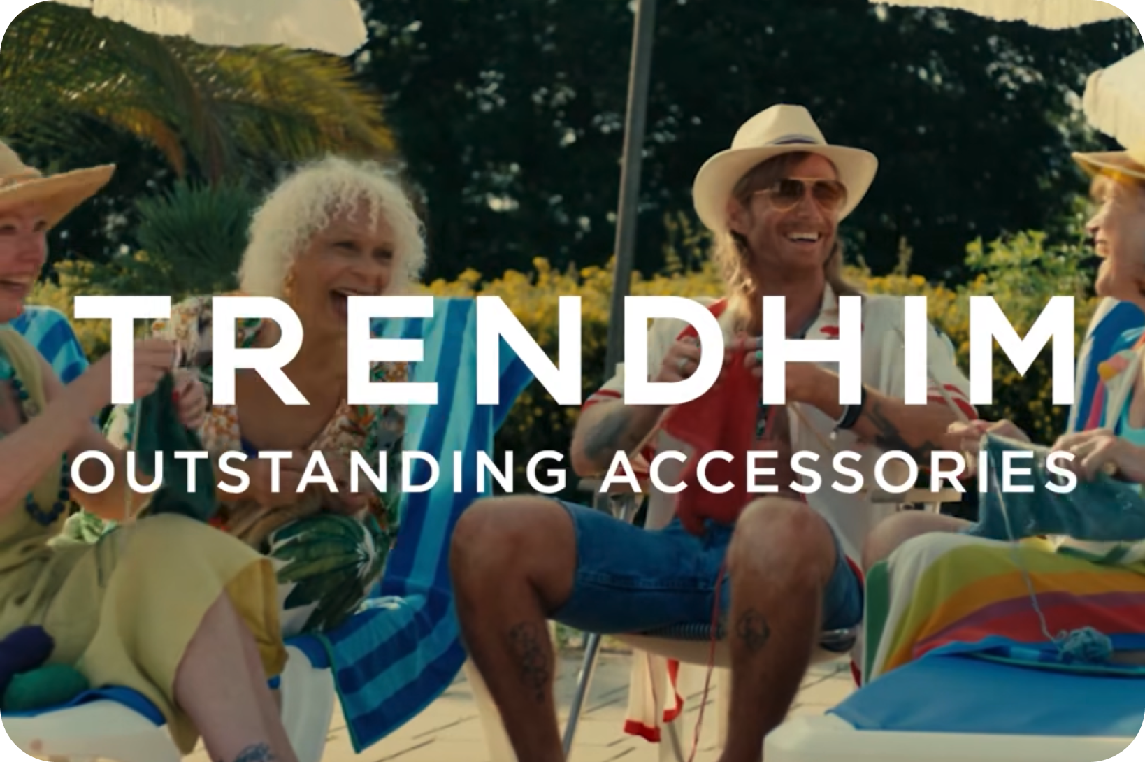 TRENDHIM OUTSTANDING ACCESSORIES text overlaid on a diverse group of laughing seniors relaxing outdoors.