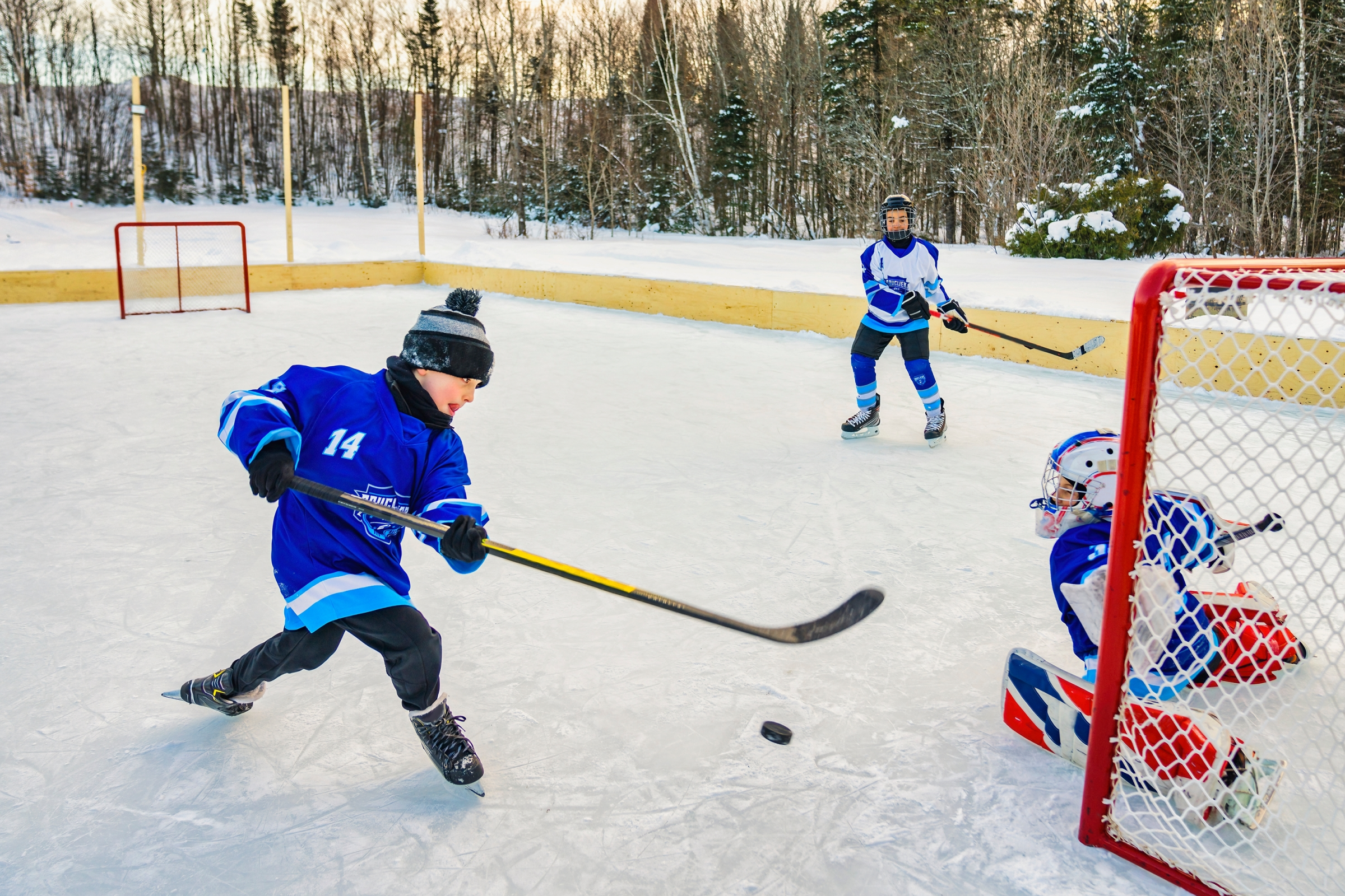 a hockey player with the number 14 on his jersey