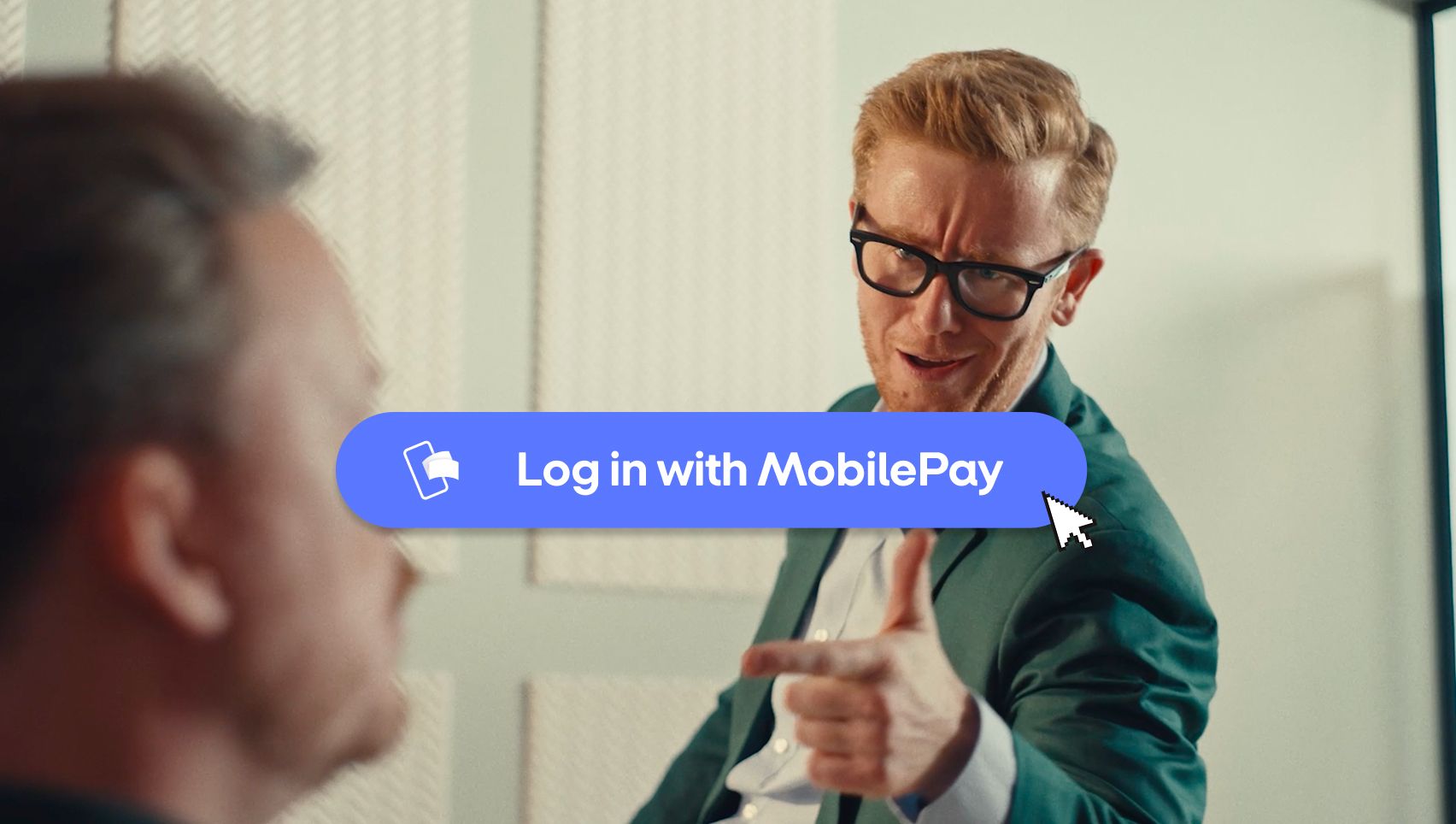 Man in glasses emphatically pointing towards a "Log in with MobilePay" button with a mouse cursor.