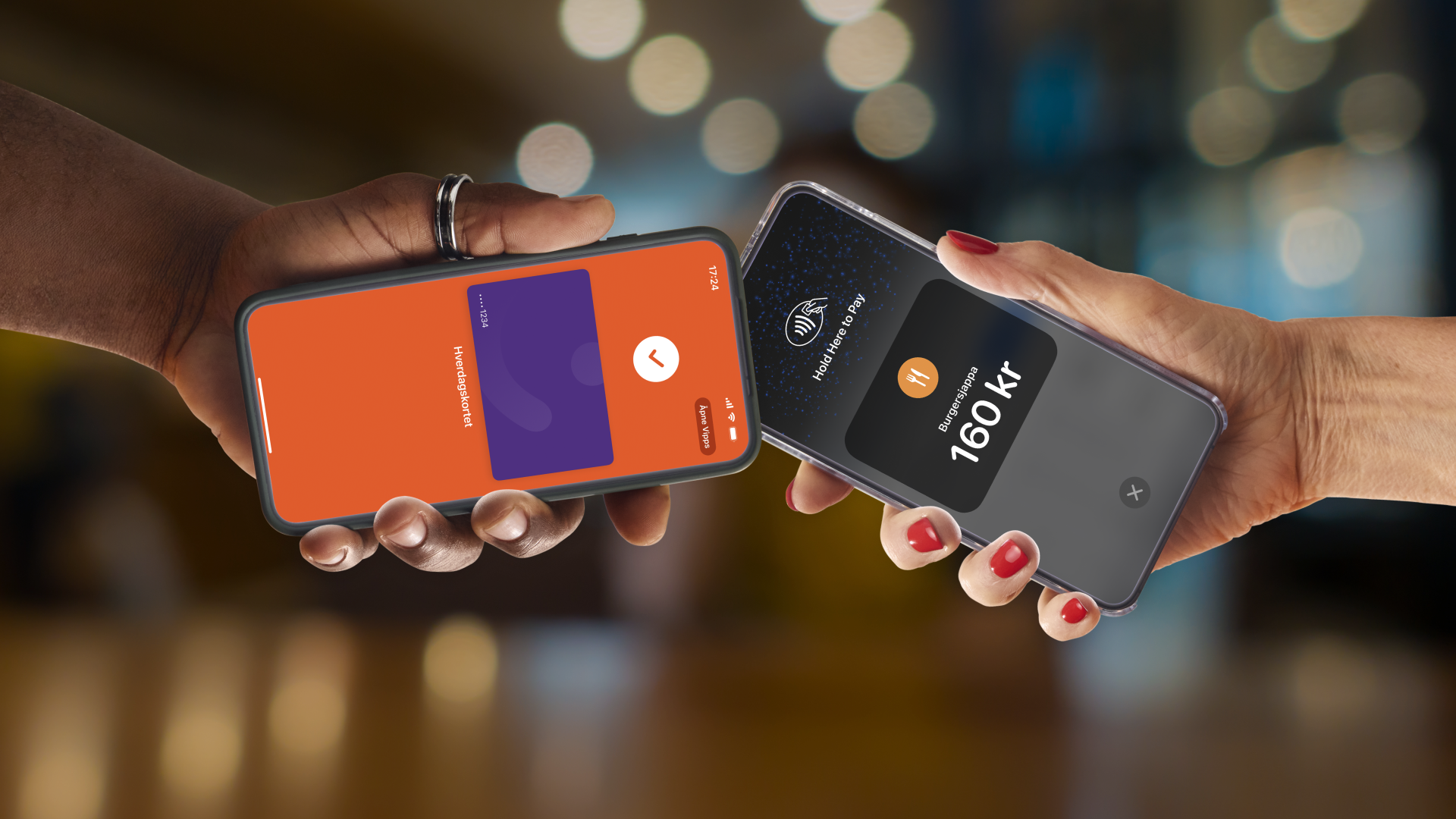 a person holding a phone that says 160 kr on it