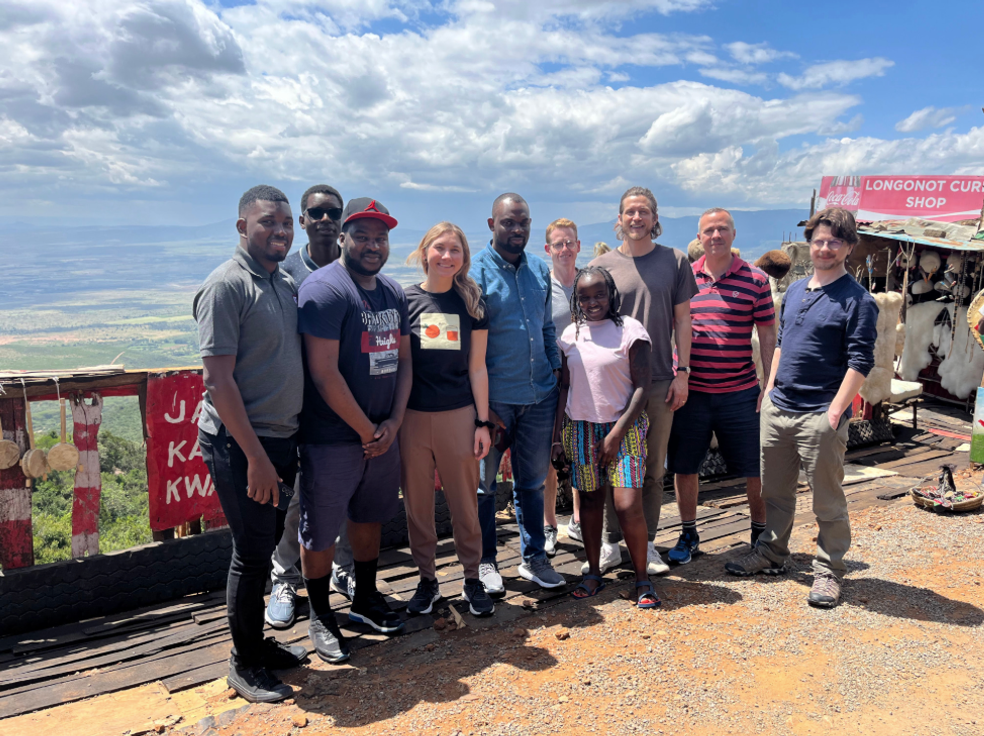 Most of the OpenFn team overlooking the Great Rift Valley