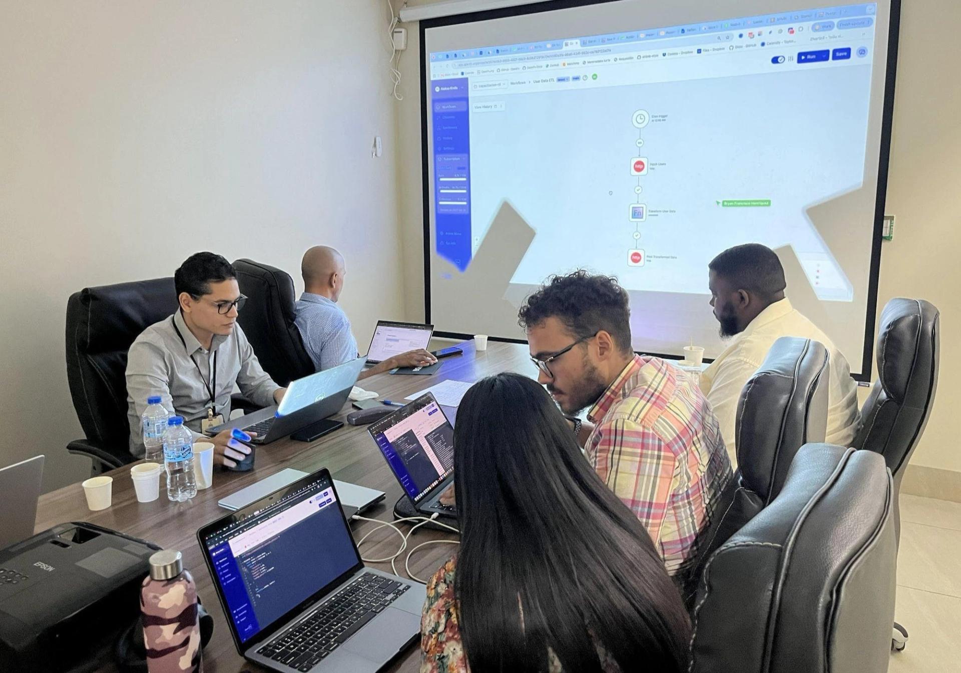Working group session with members of the government technical teams and OpenFn.