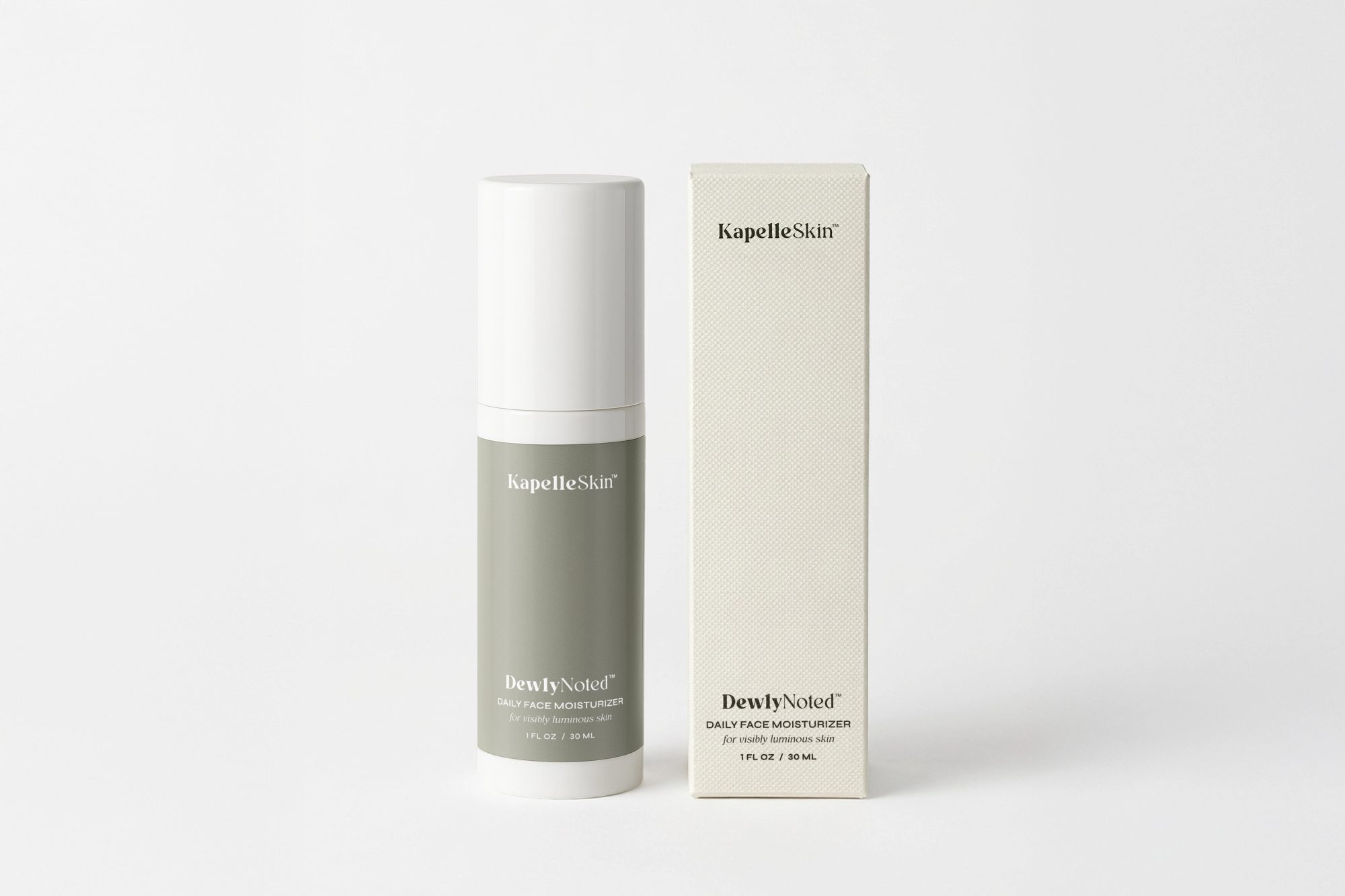 KapelleSkin moisturizer and carton presented together on a pale field.