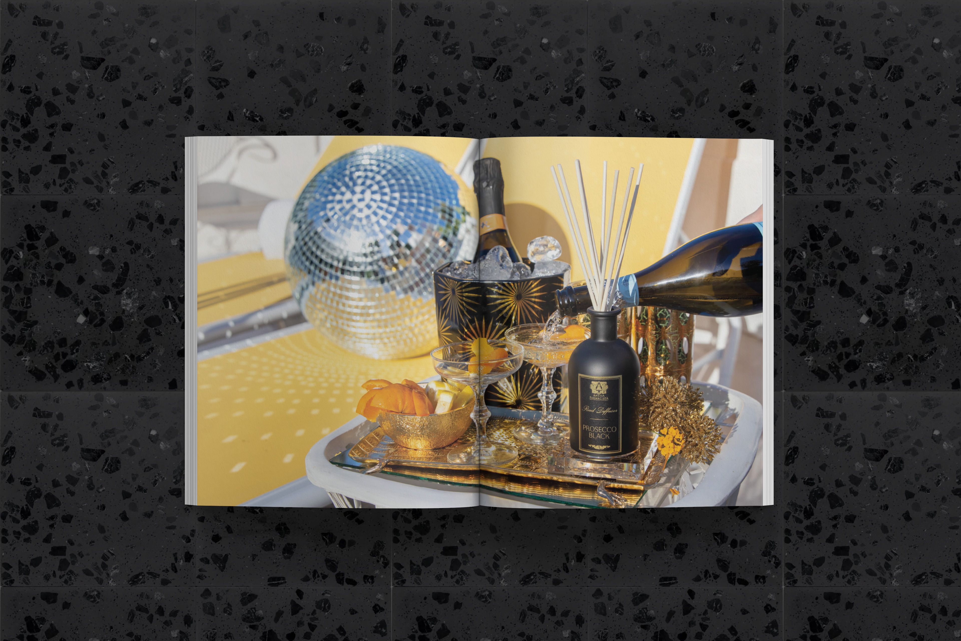Champagne poolside under a disco ball, my foiled starburst packaging chilling in the ice bucket.