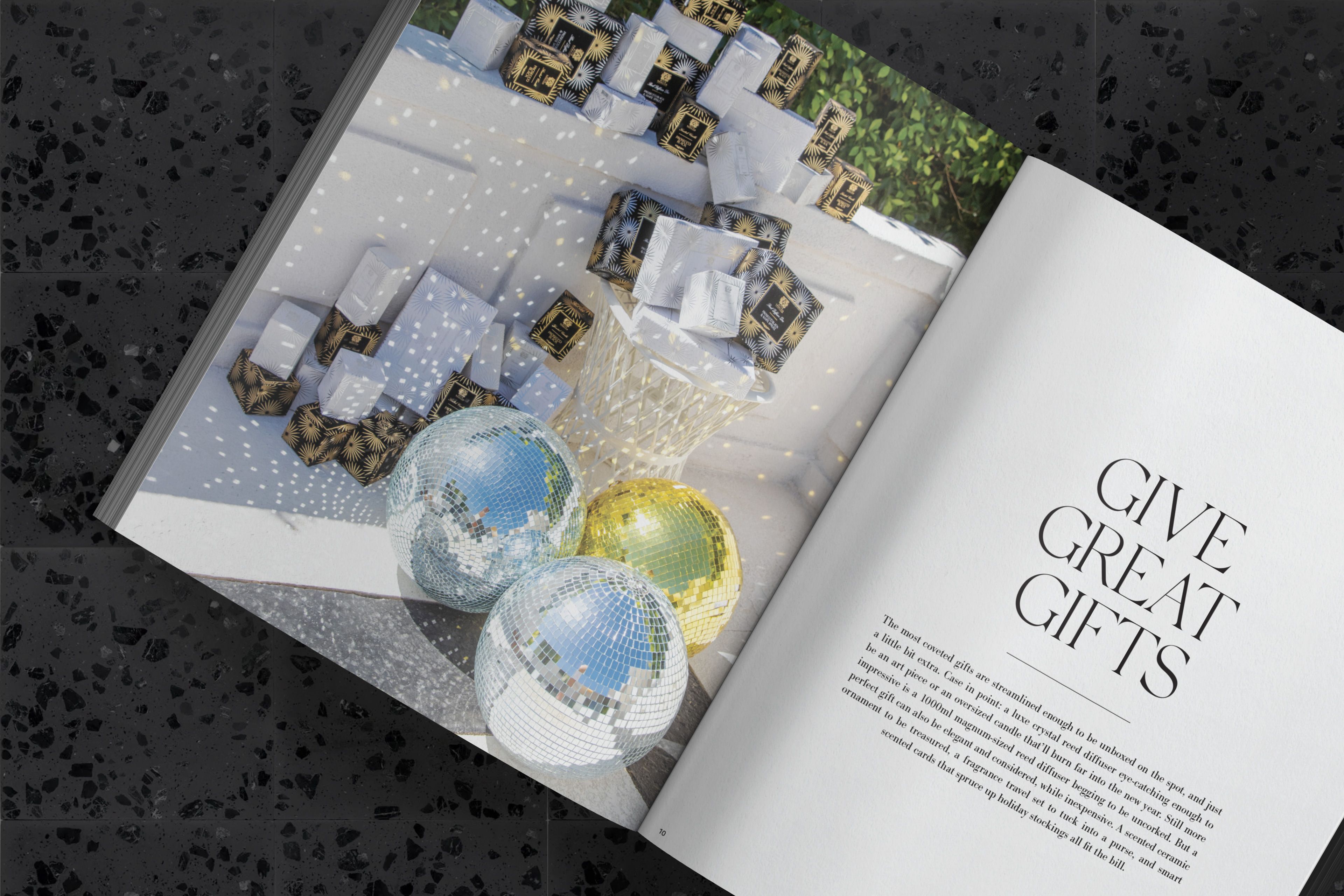 The gift boxes I designed, gold and silver foil on flocked velvet, tumbling down the steps with the disco balls.