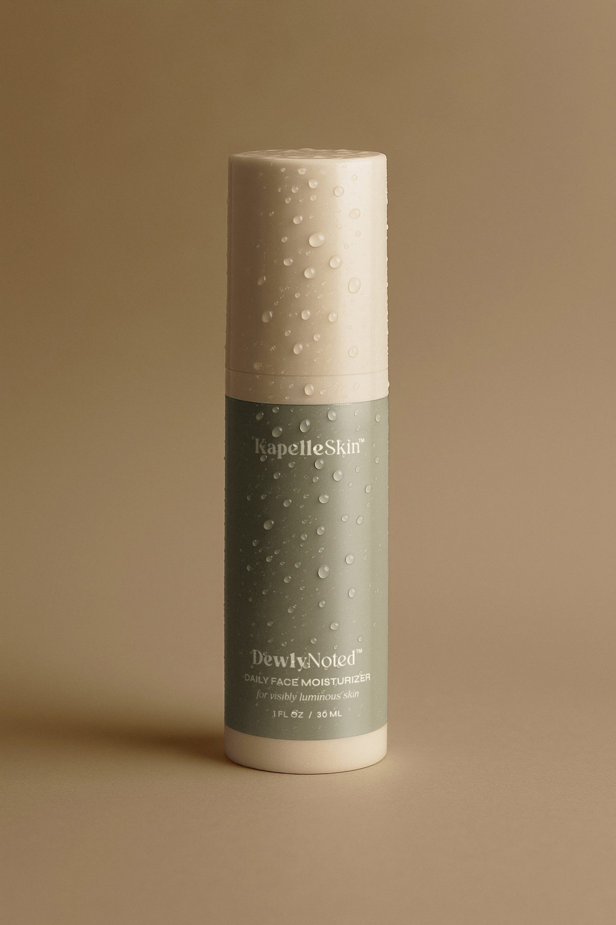 KapelleSkin DewlyNoted moisturizer standing alone against a warm taupe field.