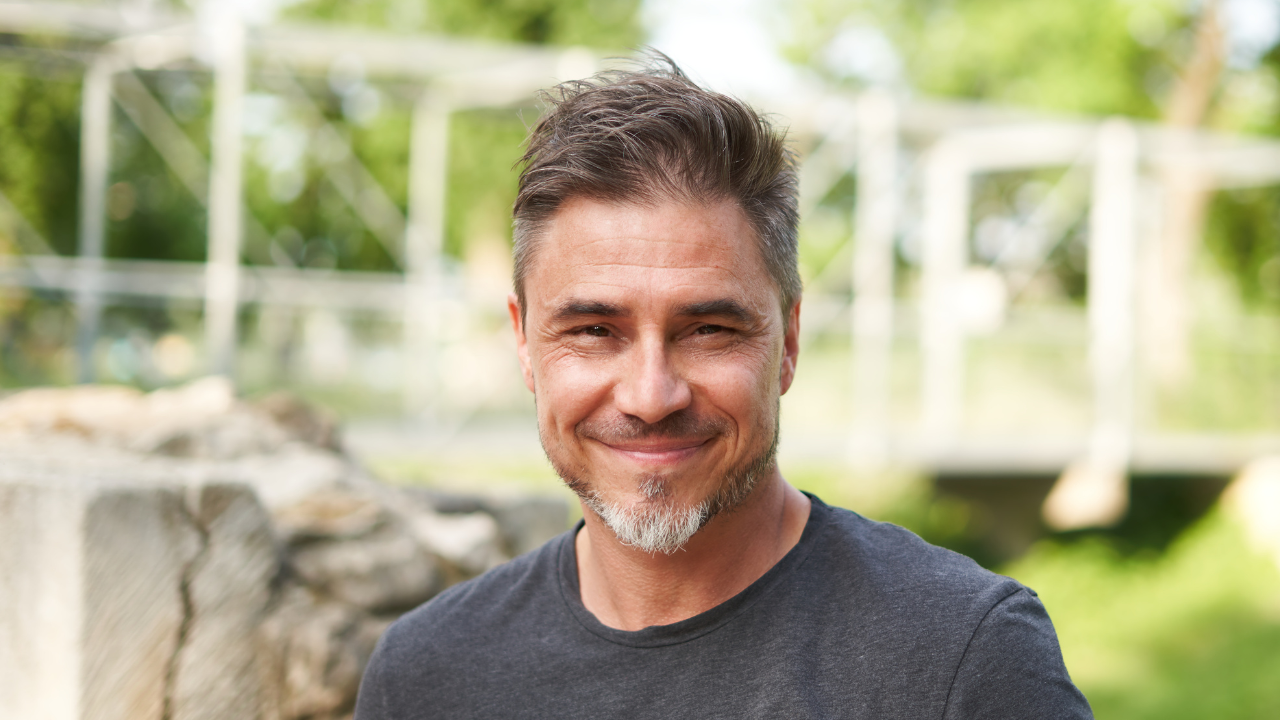 Midlife man representing changing energy, strength, and men’s hormone health.