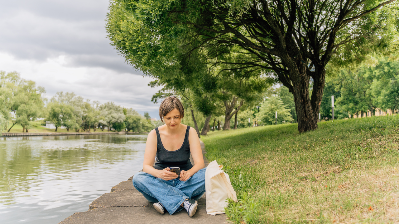 Confident midlife woman representing the transition through perimenopause and changing health needs.