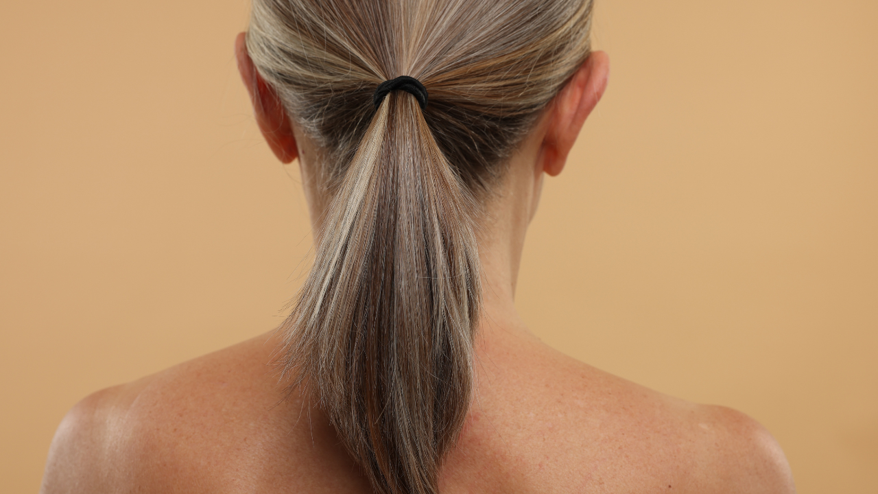 Natural adult hair representing changes in hair density and hair wellness.