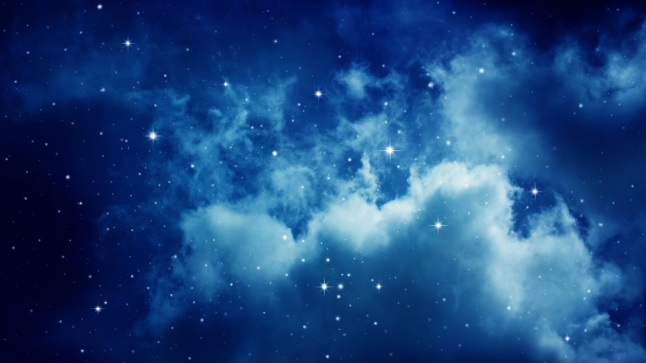 Deep blue night sky filled with small glowing stars and soft, luminous clouds.