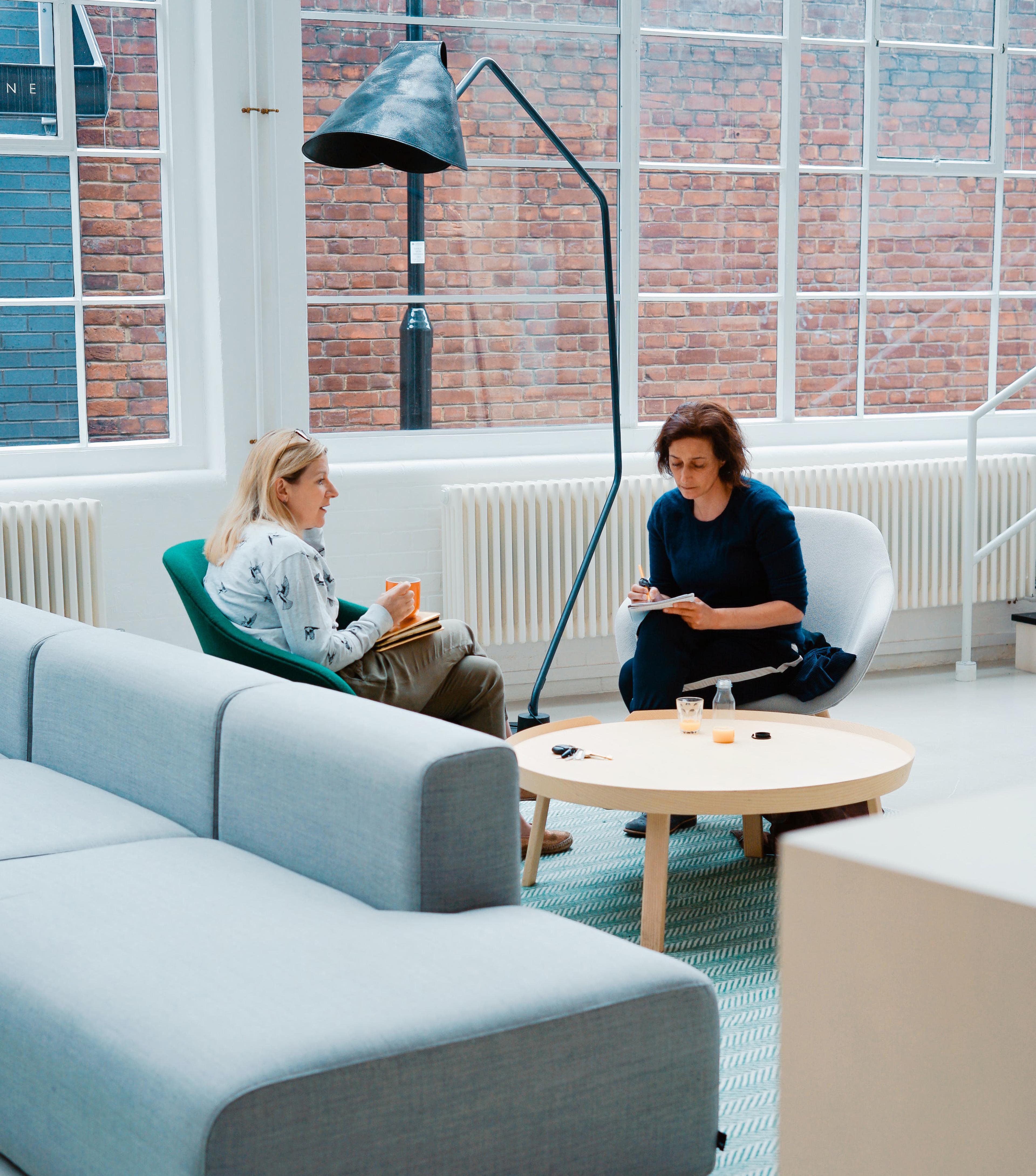 two colleagues chatting