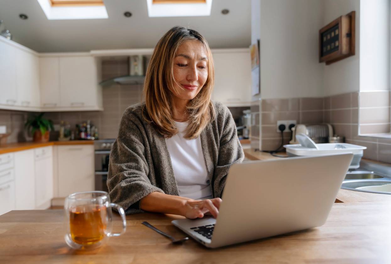 Mature woman using laptop